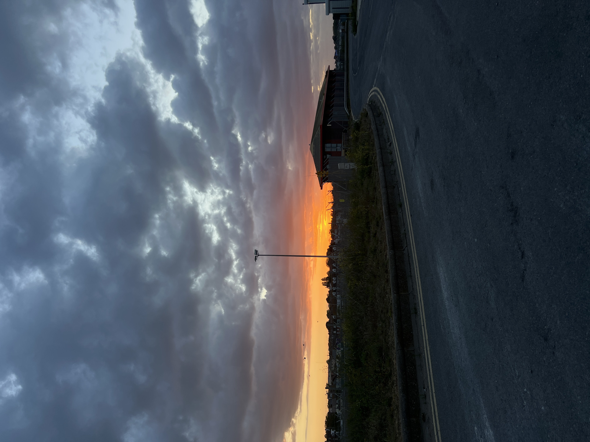 Sunset observed over Great Yarmouth with orange yellow sky