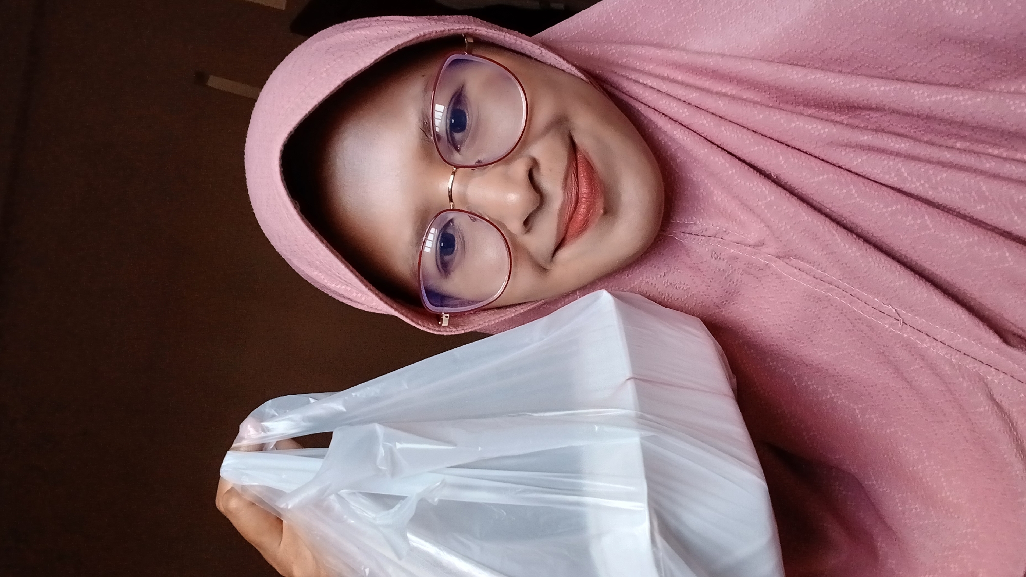 Woman's morning routine documented in Lhokseumawe, Indonesia