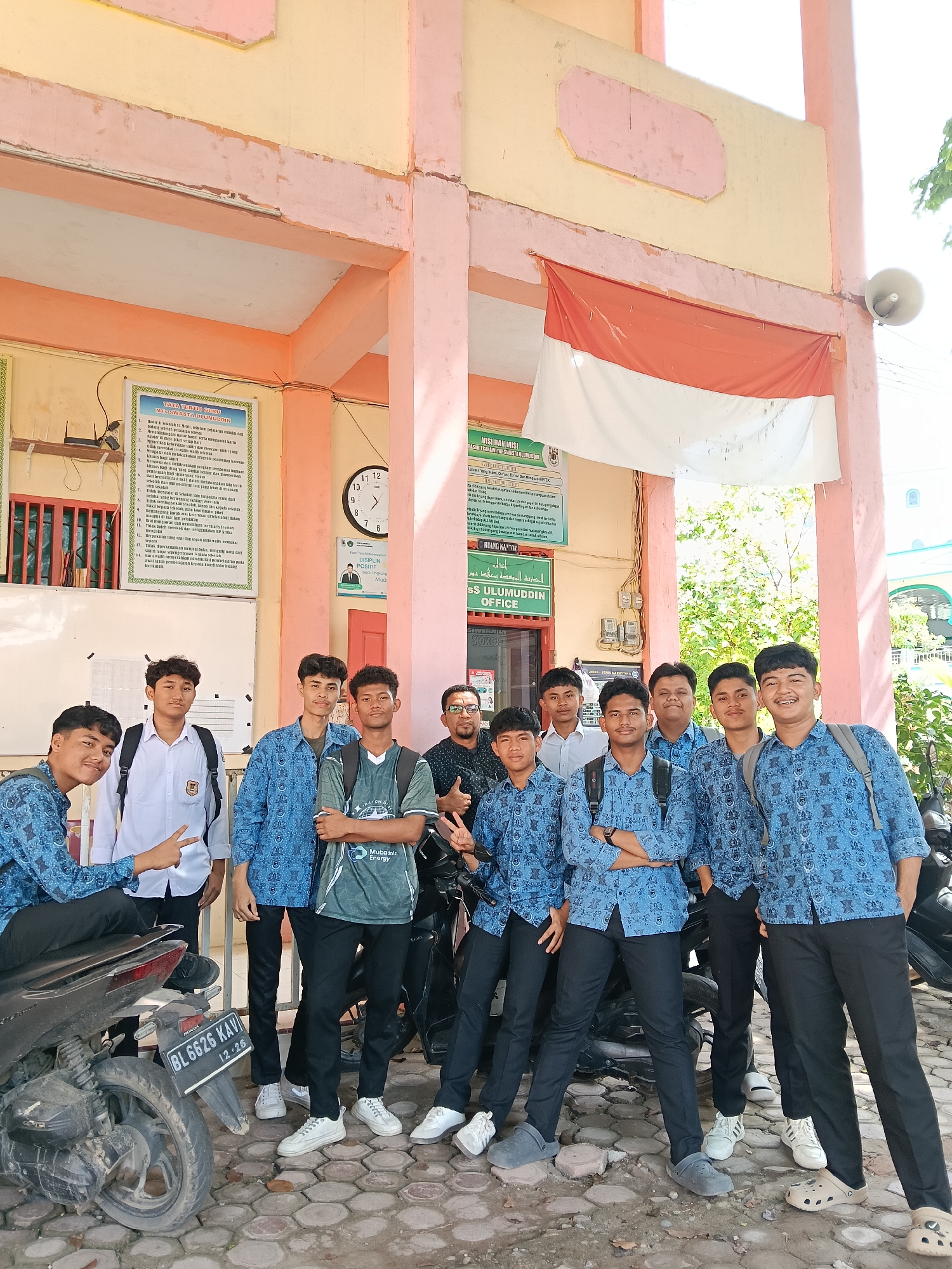 Students and wildlife observed in Lhokseumawe Indonesia morning hours