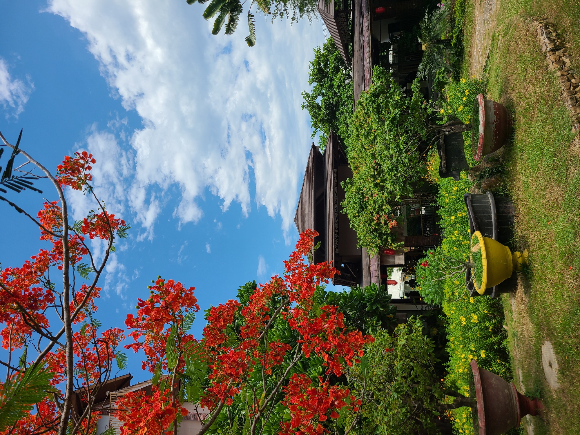 Morning at a lush resort garden and waterfall park in Nha Trang