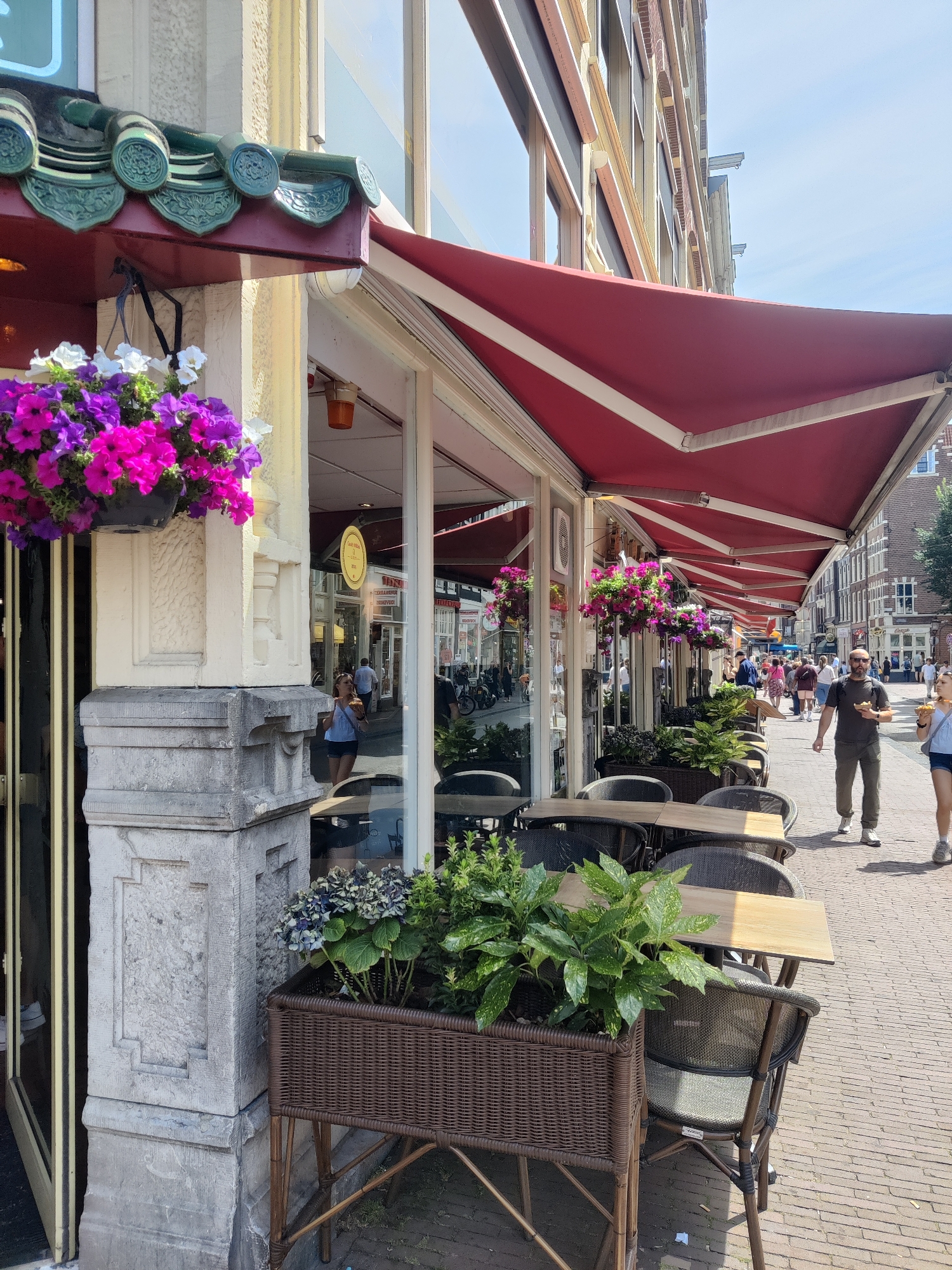 Amsterdam street life: canals, clogs, and souvenir shops