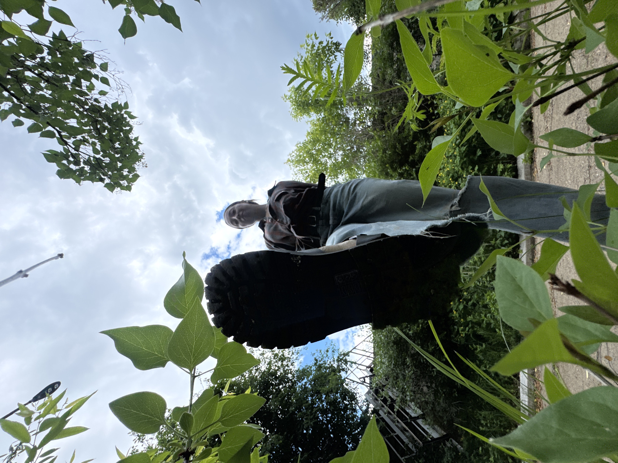Person photographed from various angles on concrete path in Chaikovsky
