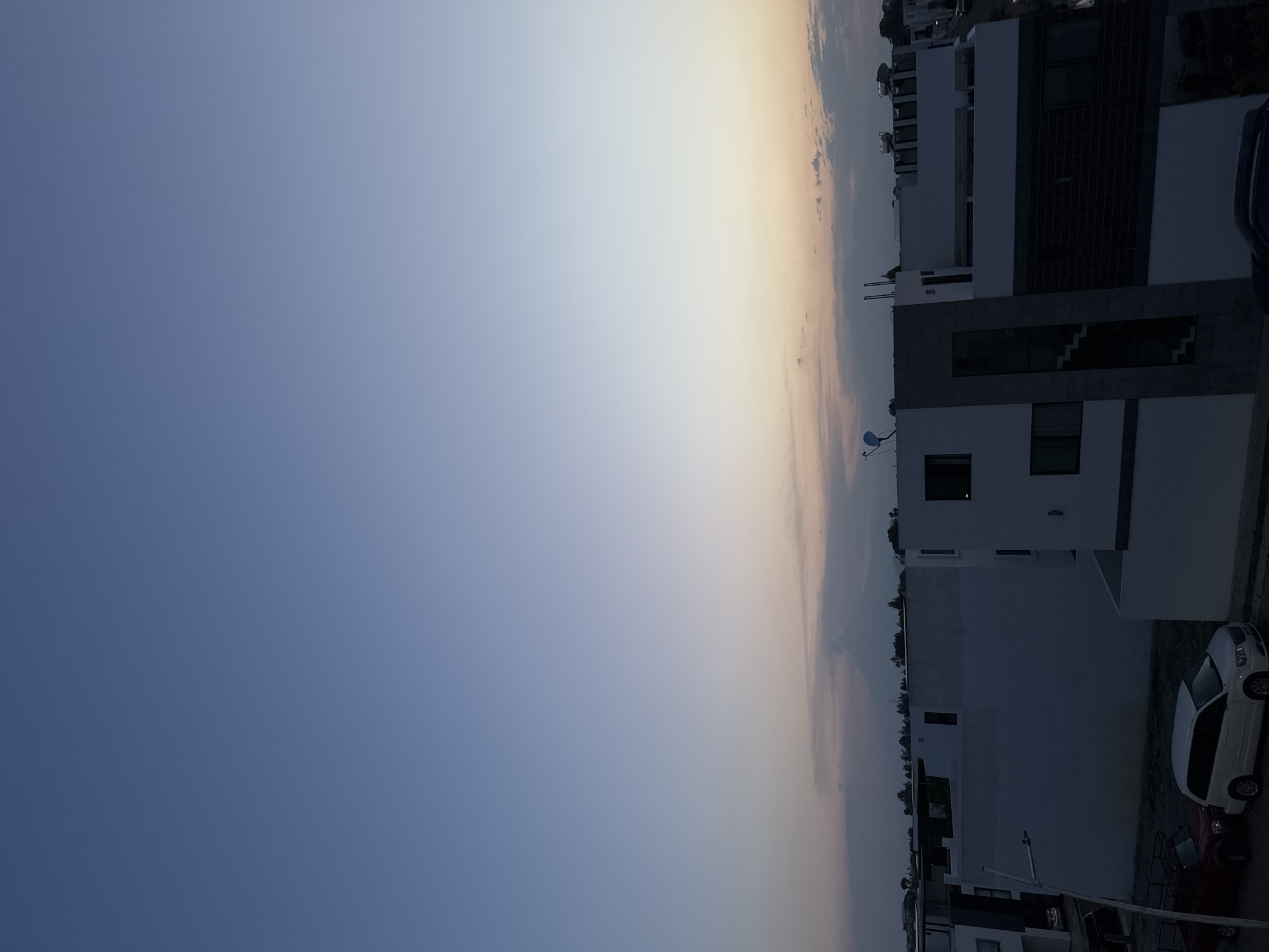 Dusk settles over residential Puebla neighborhood, Mexico