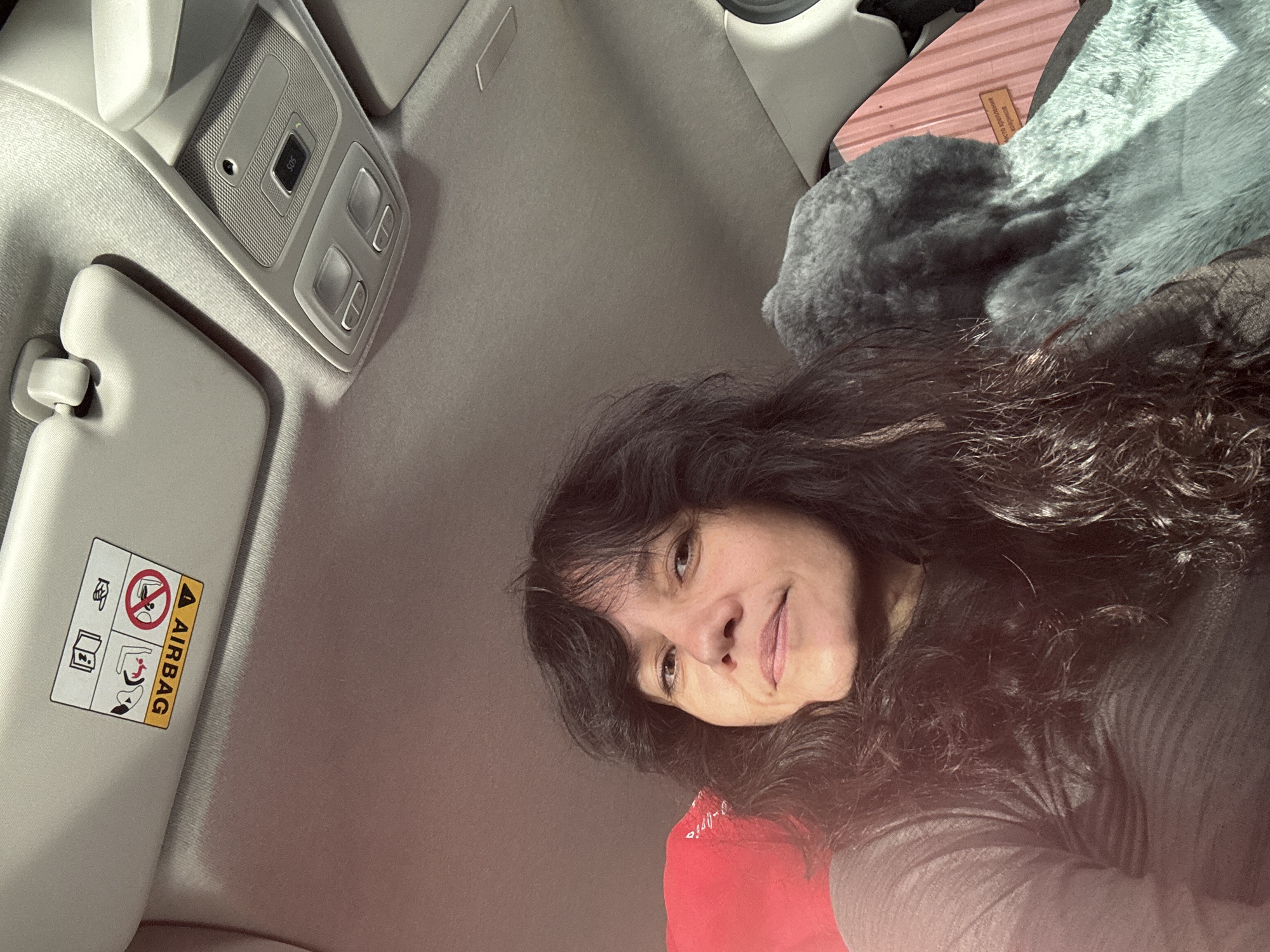 Woman takes vehicle selfie in Solikamsk, Russia