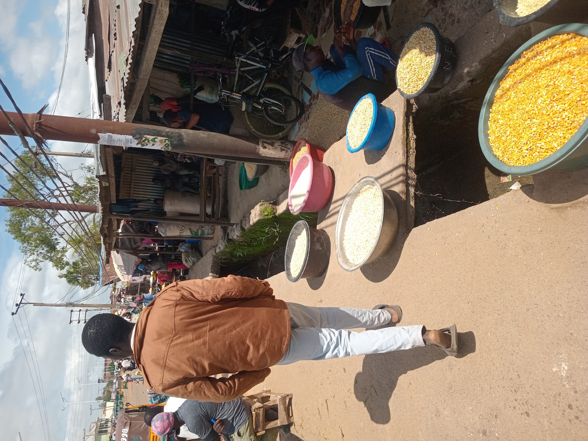 Selfies and street-level scenes at a Bukuru market
