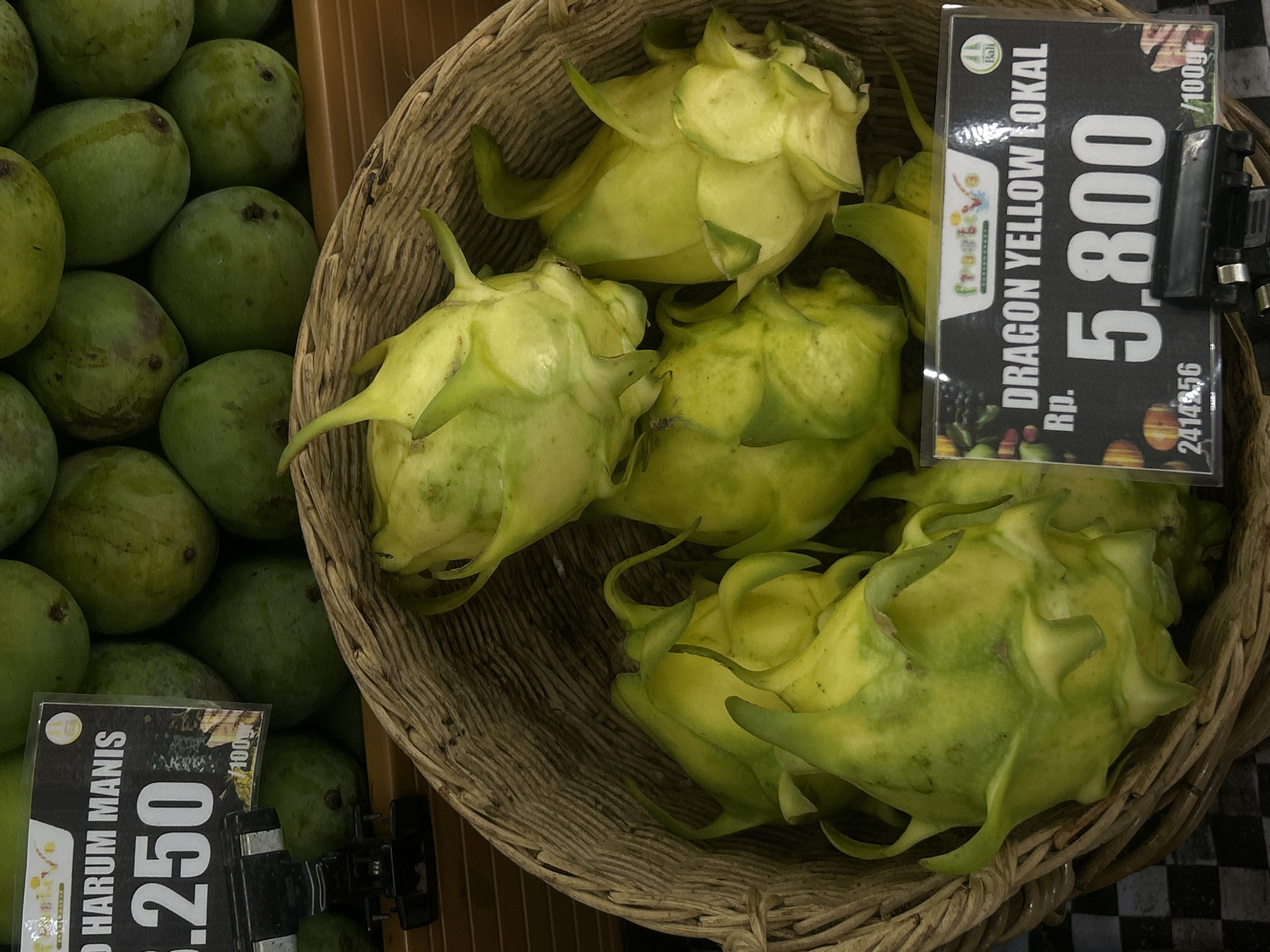 Green mangoes displayed at North Kuta market Monday morning