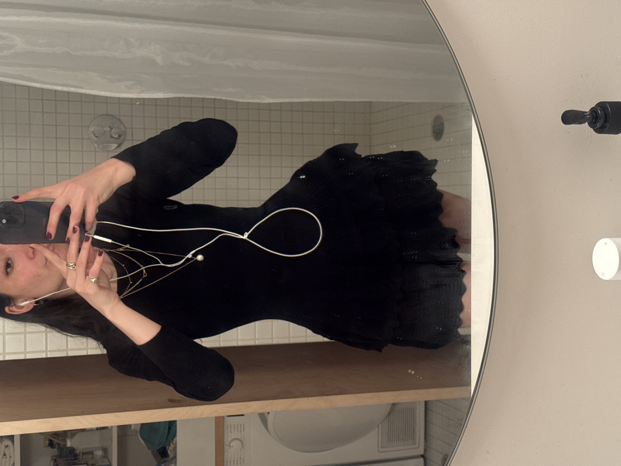 Late night mirror selfie captured in New York bathroom