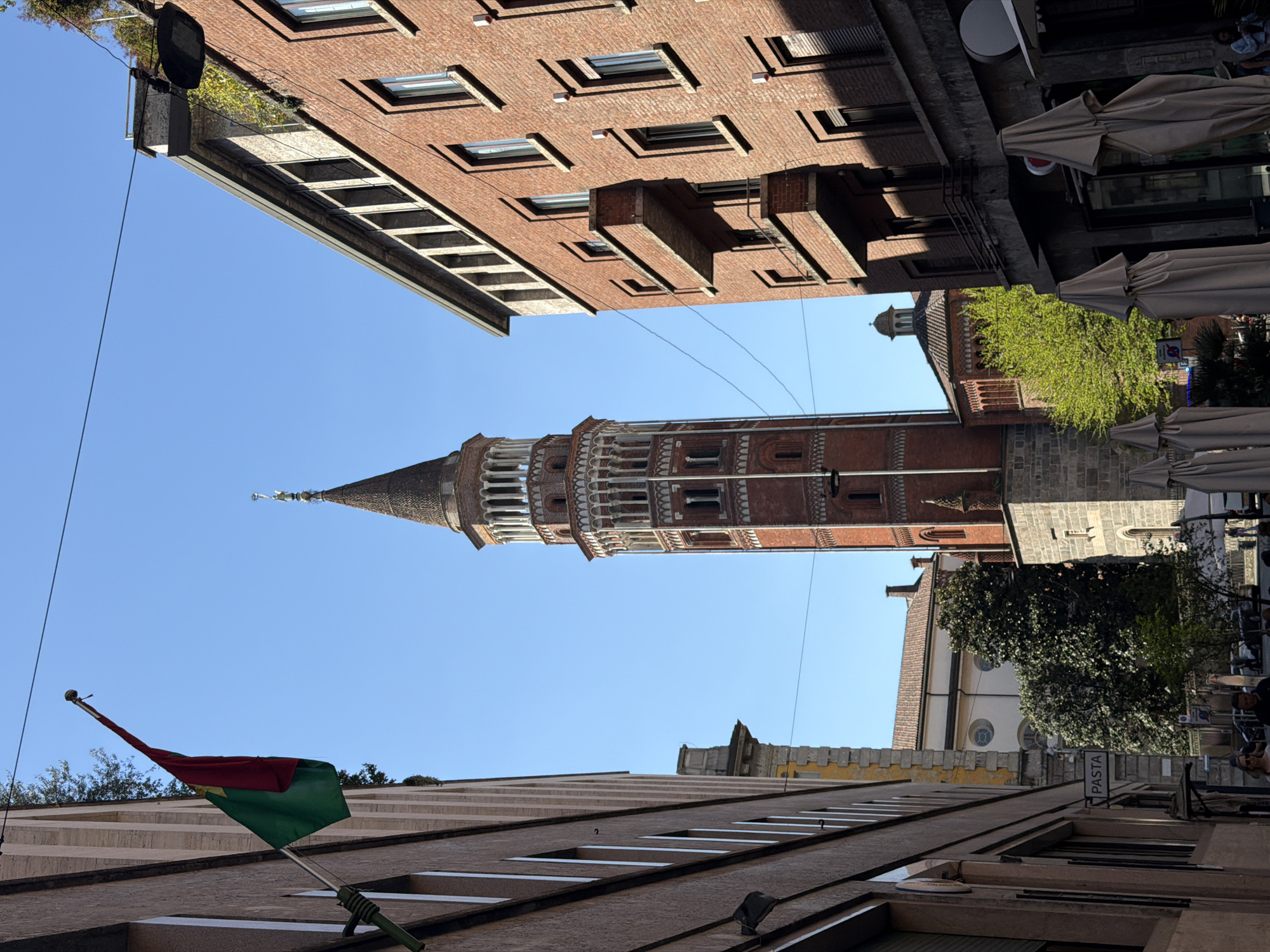 Street-level view captures Torre Velasca tower in Milan