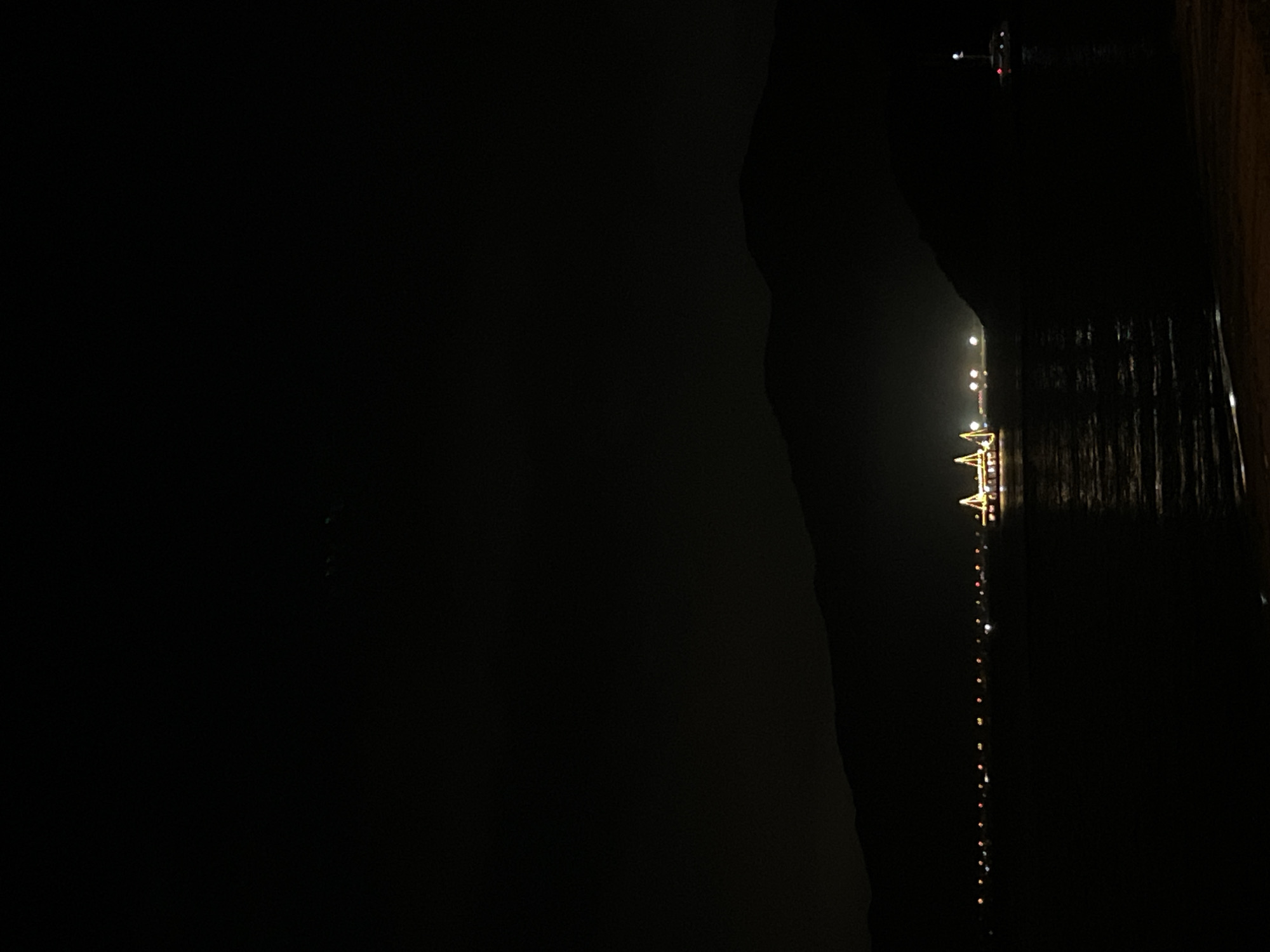 Nighttime celebration scenes captured at Nha Trang waterfront cafe