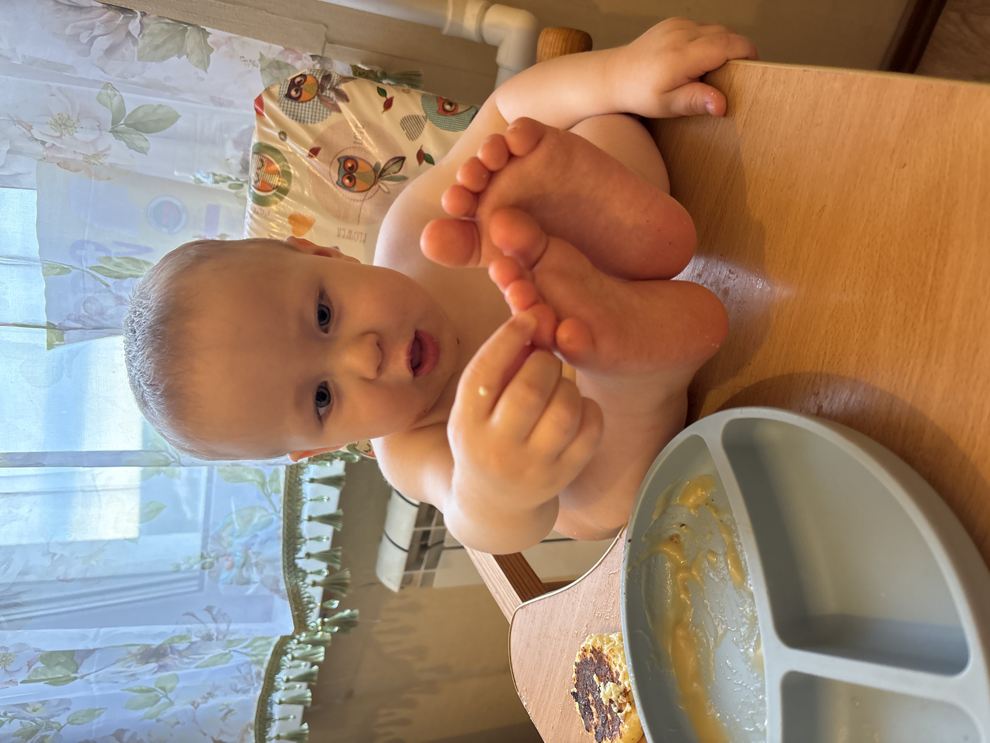 Baby at mealtime in a high chair, Naberezhnye Chelny