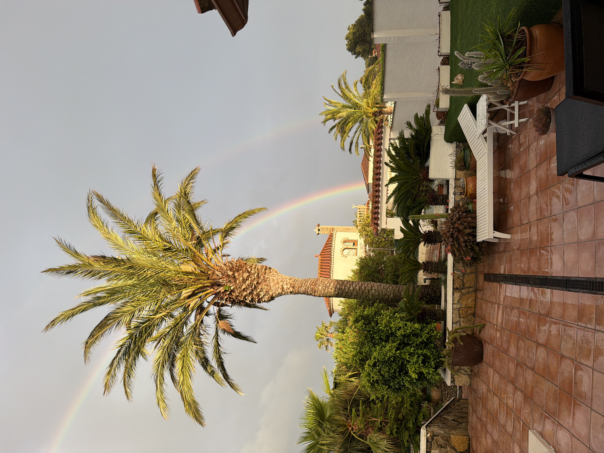 Double rainbow appears over Mont-roig del Camp, Spain
