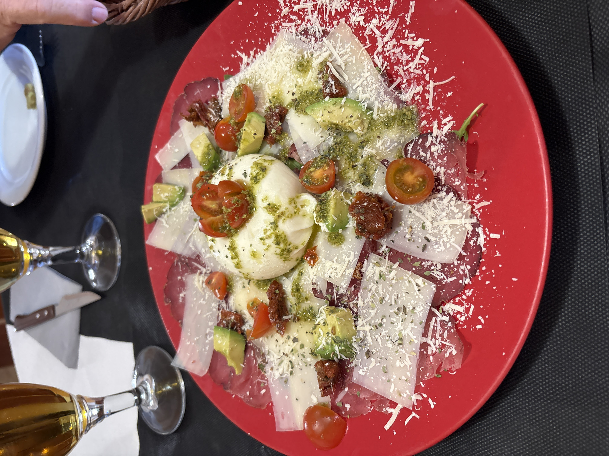 Burrata salad photographed at Spanish coastal restaurant