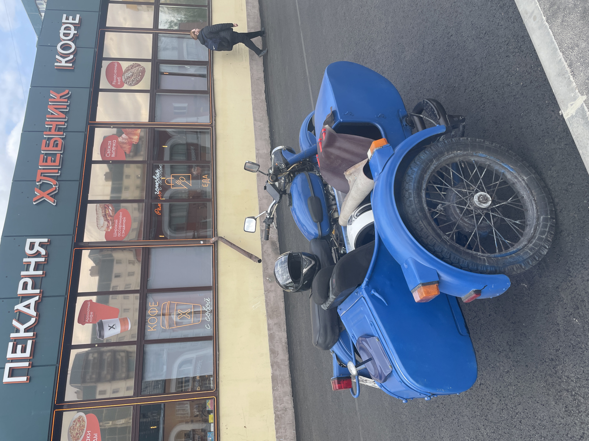 Street scenes and blue motorcycle documented in Saint Petersburg