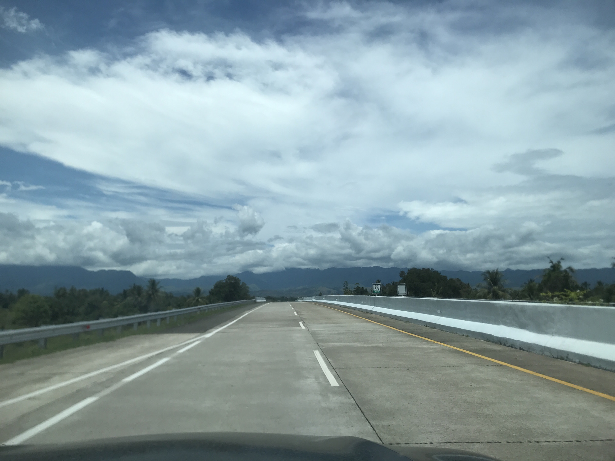 Morning highway traffic documented in Cotkareung, Indonesia