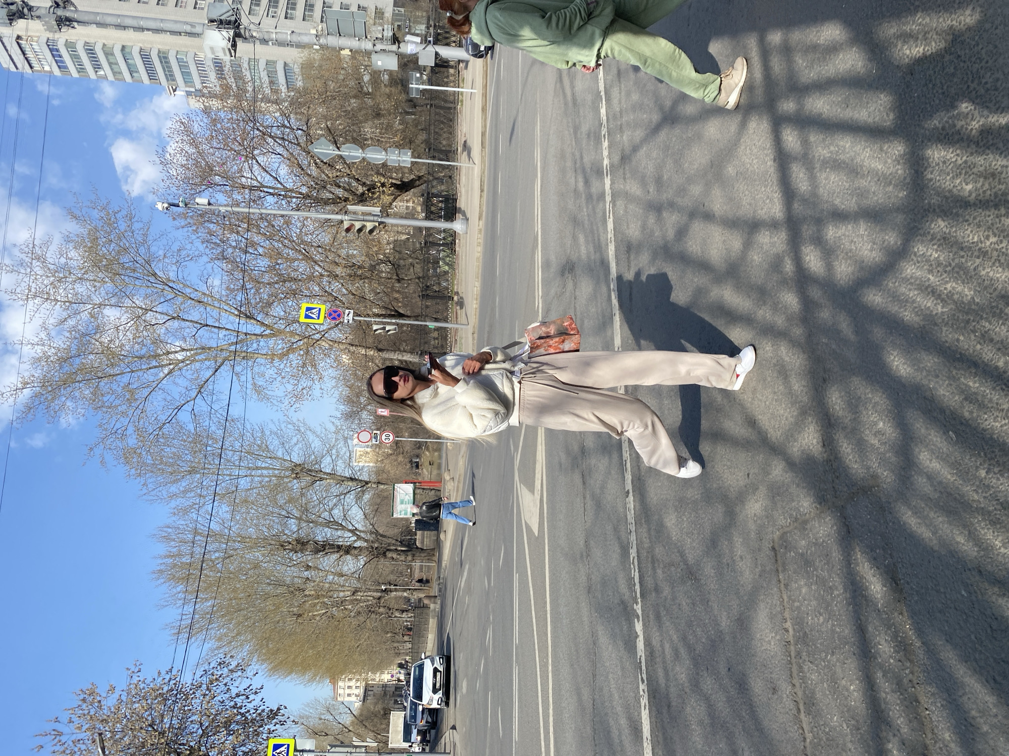 Pedestrians navigate streets and sidewalks in Khimki