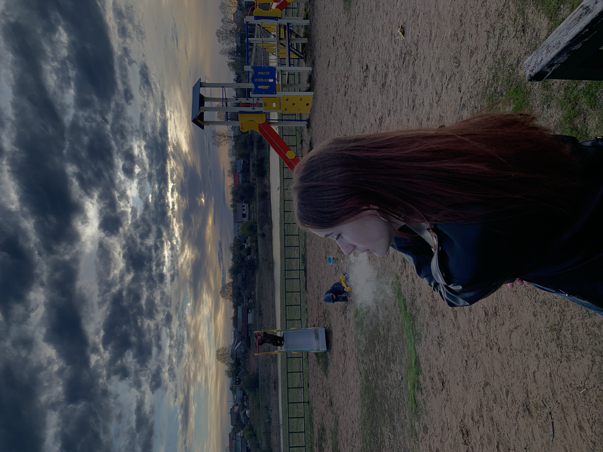 Woman documents playground visit in rural Russian town