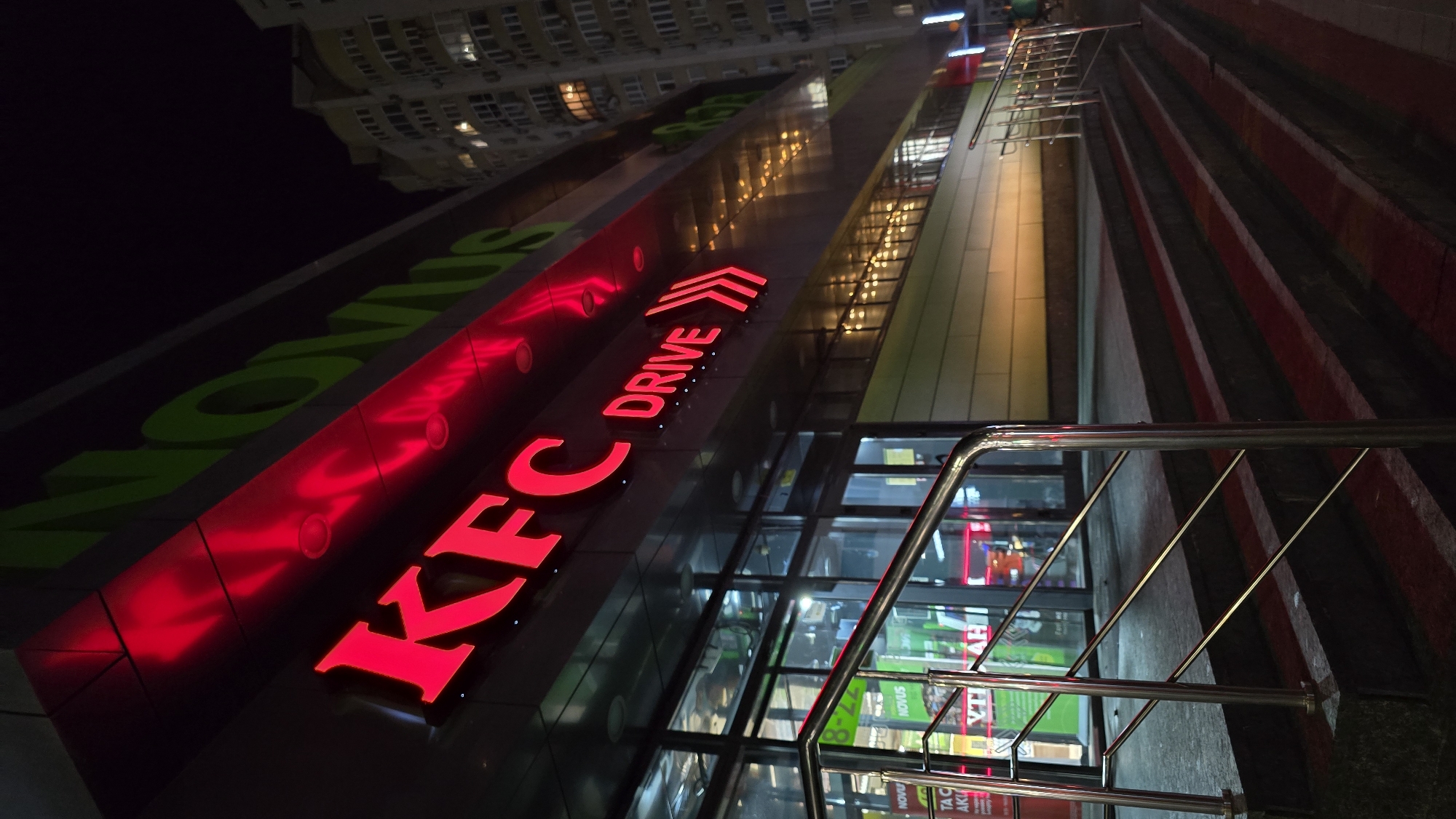 Evening scenes documented across Kyiv's urban waterfront and commercial districts