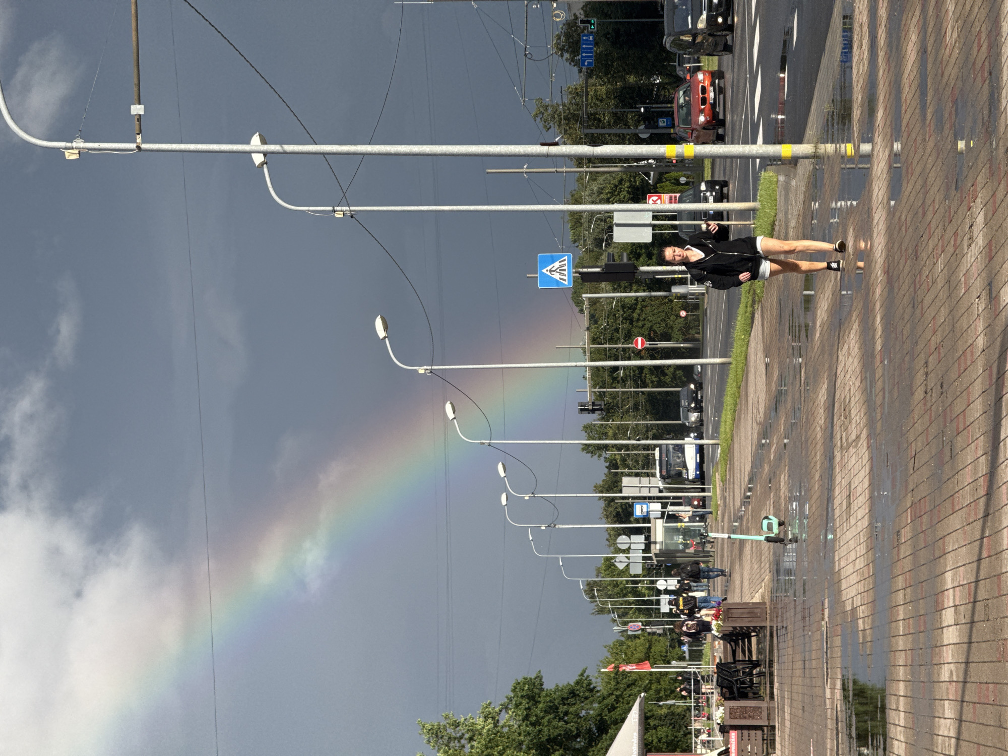 Rainbow over wet Riga streets after a summer rain