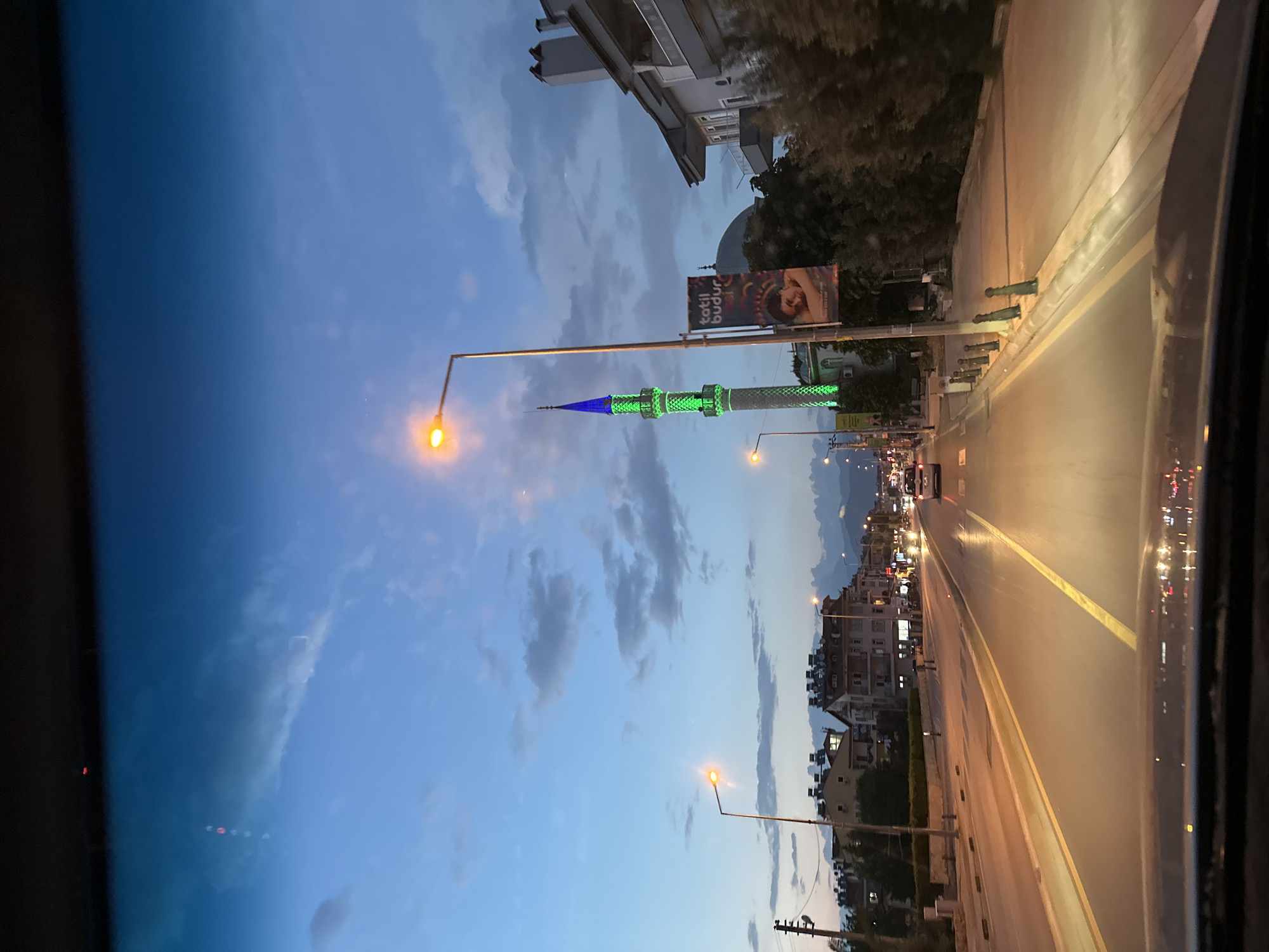 Illuminated mosque minaret observed at dusk in Fethiye