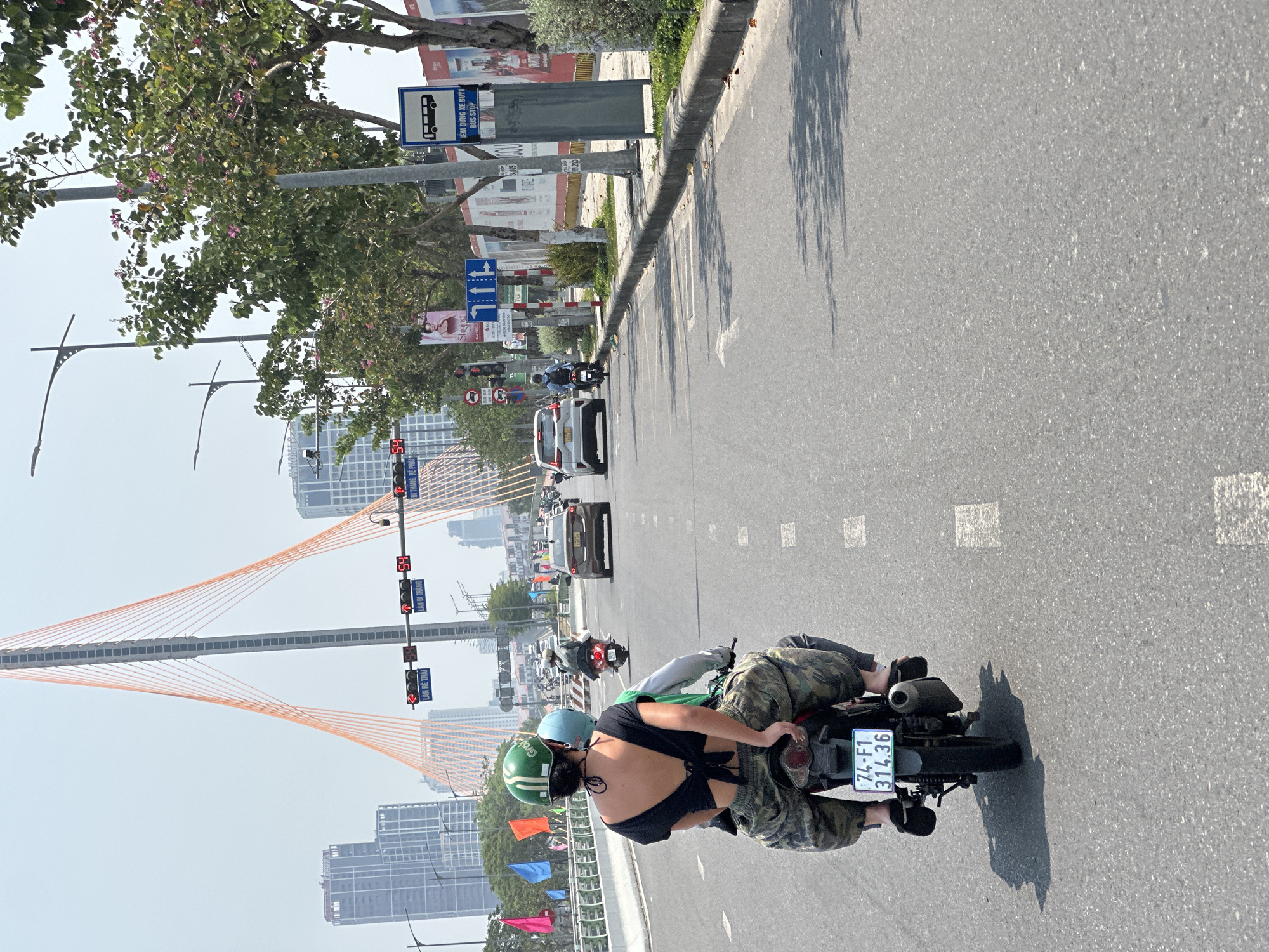 Motorcyclist travels city street in Đà Nẵng, Vietnam