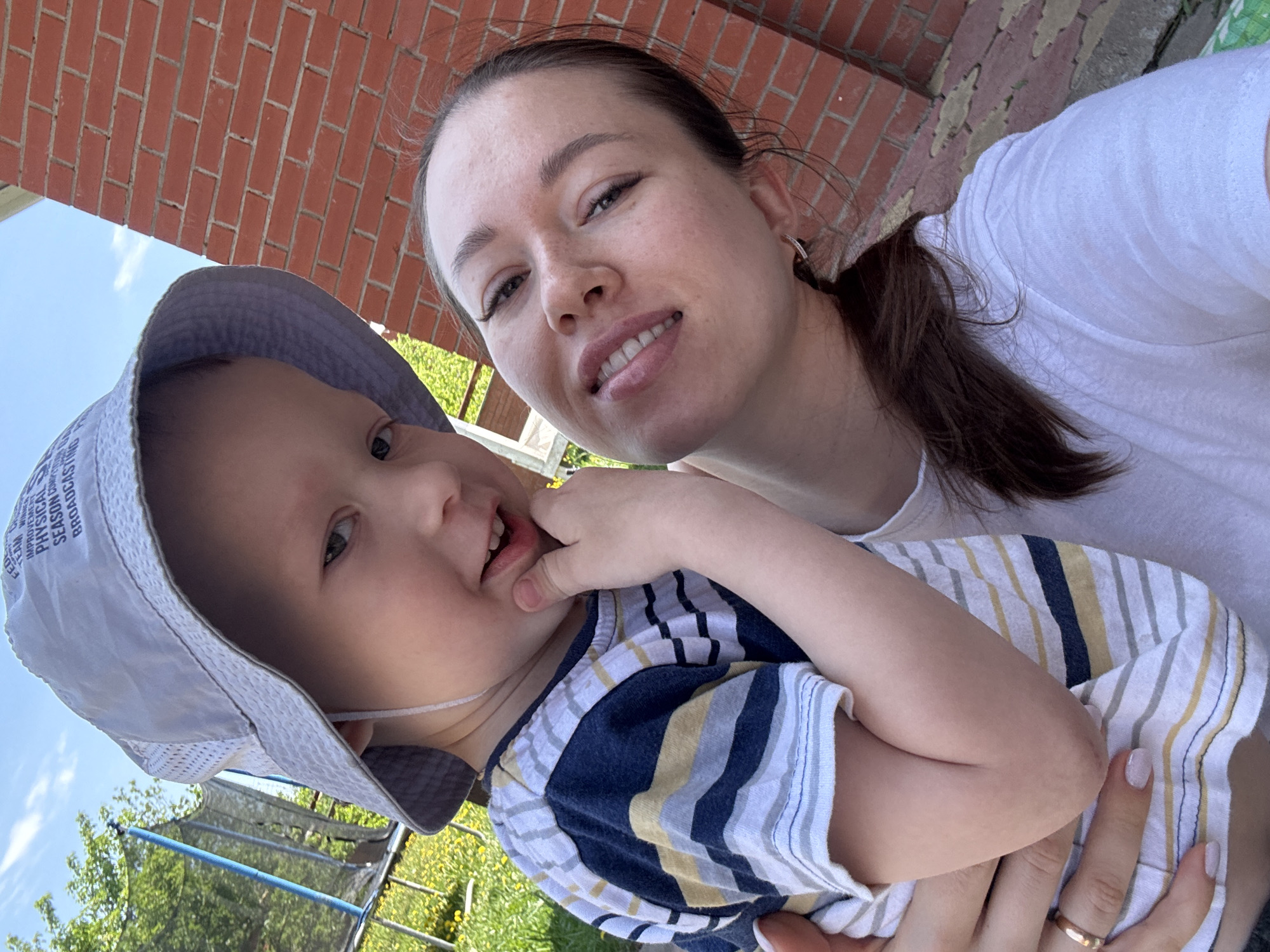 Mother and child enjoy morning playtime in Ферма, Russia