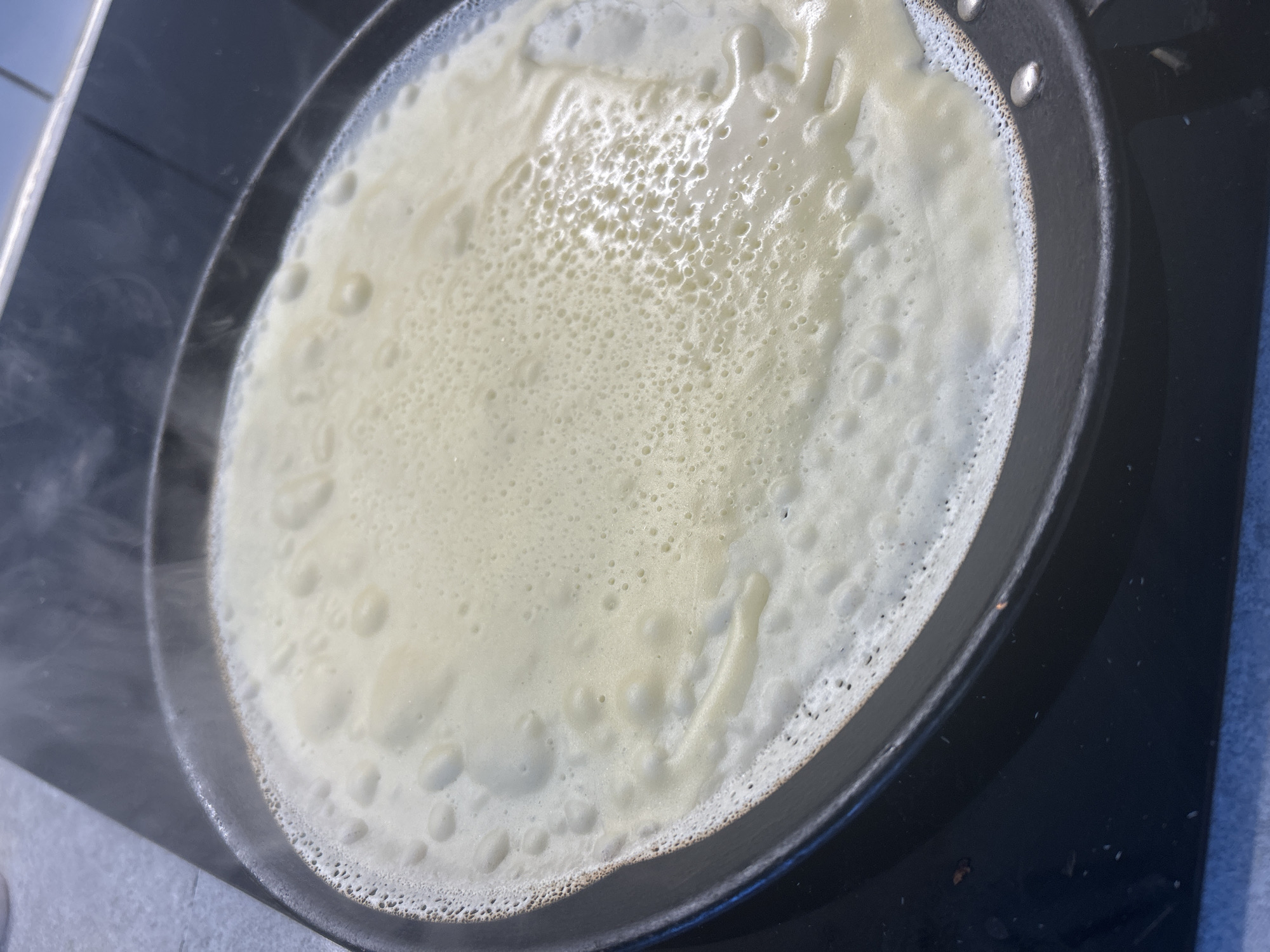 Crepe cooking in pan captured in Schiltigheim, France