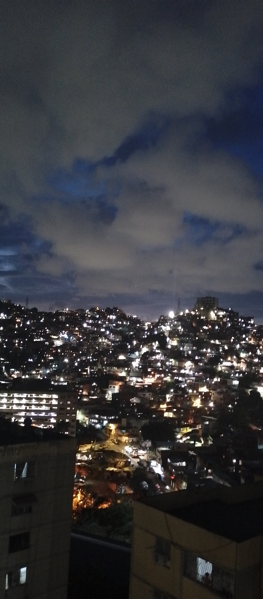 Caracas nighttime cityscapes and domestic cat scenes documented