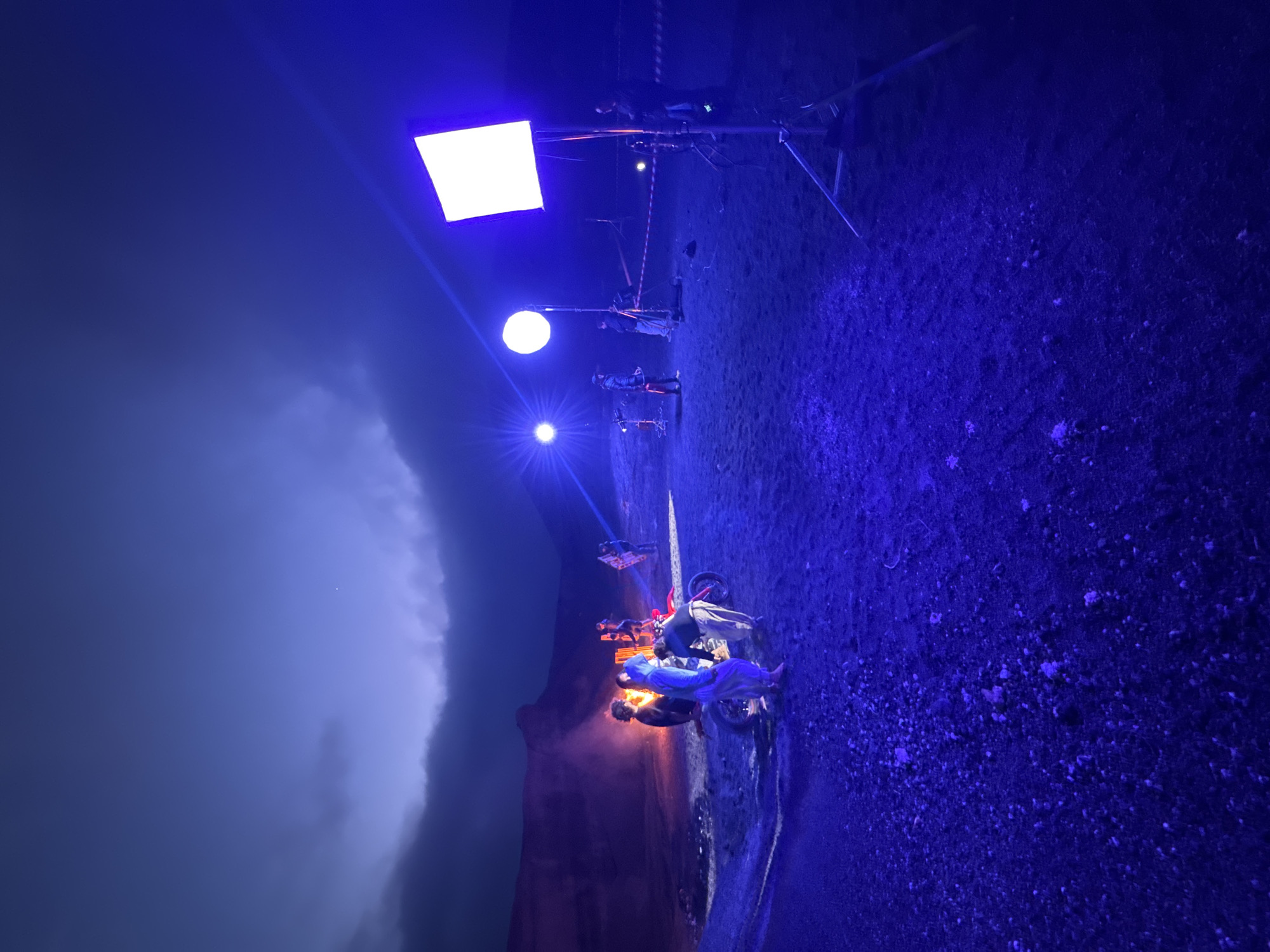 Nighttime film production underway in Teguise, Spain with motorcycle scene
