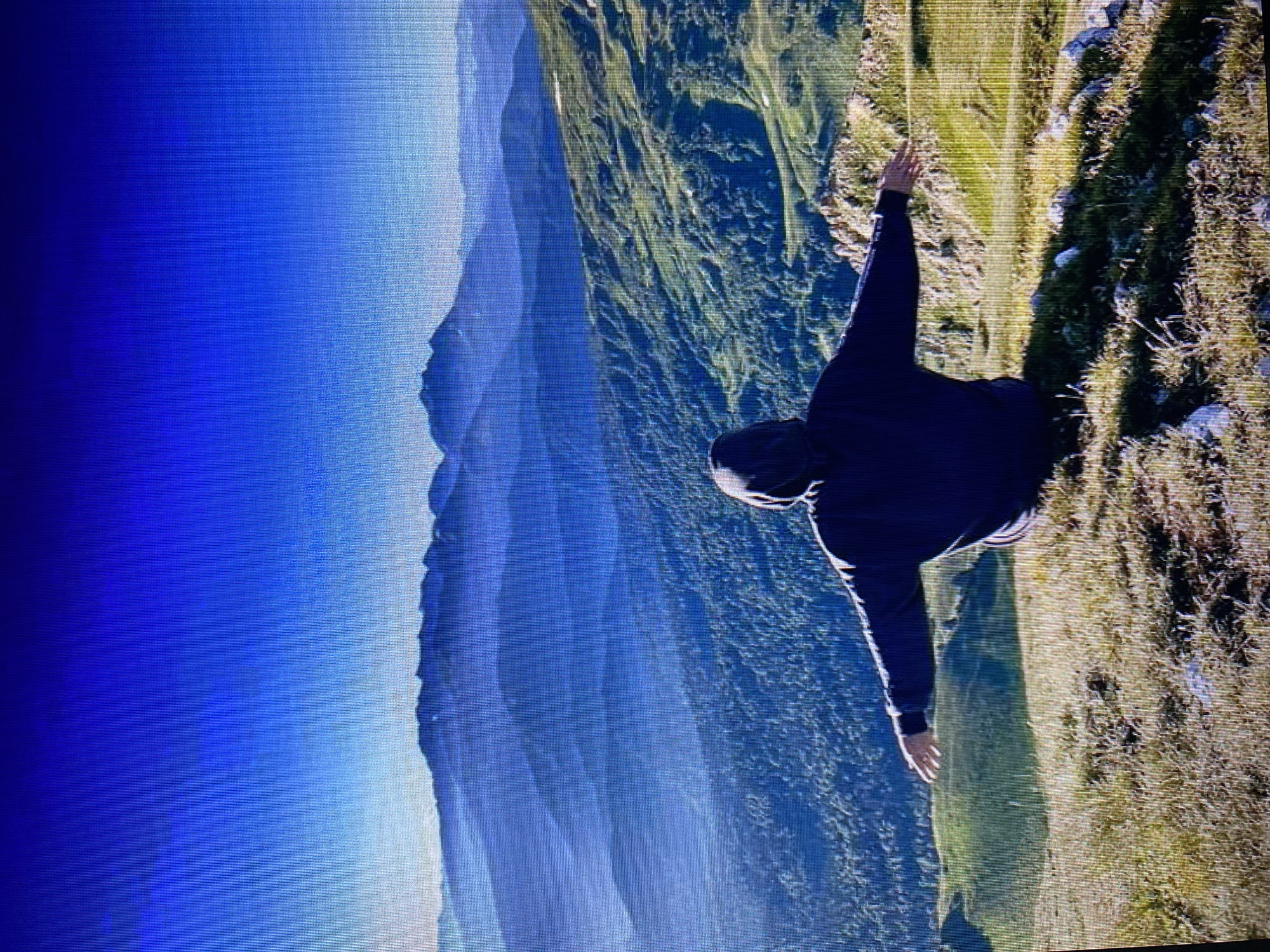 Mountain day: clifftop poses, rocky terrain, big skies