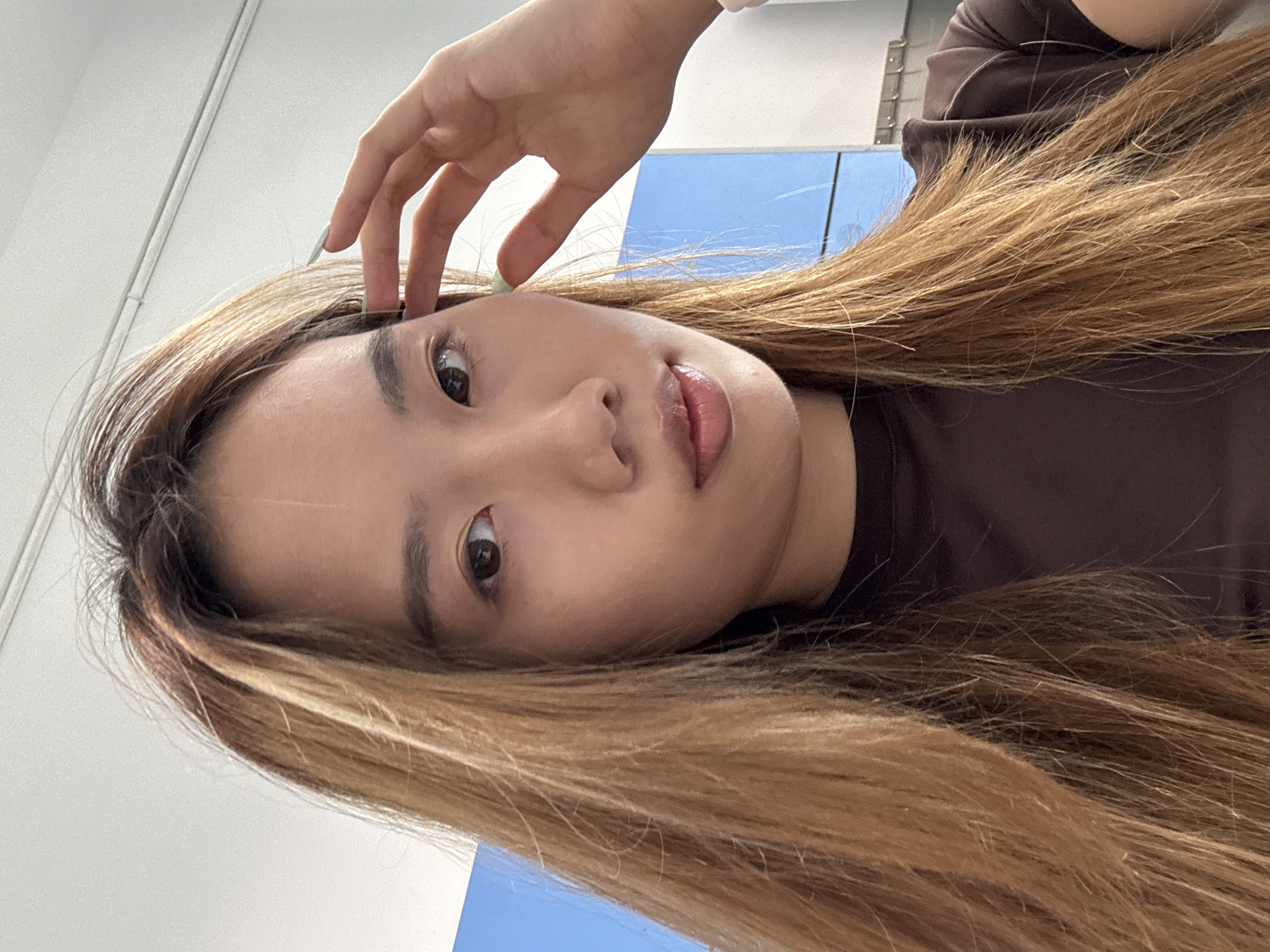 Woman documents school visit with selfies in Liangjiang, China
