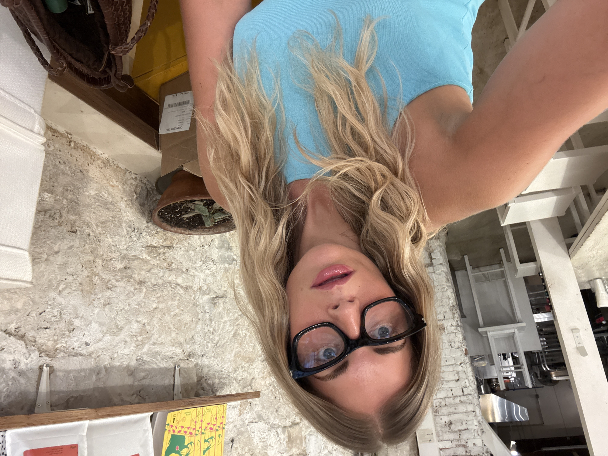 Selfies at a Paris café, baguettes on the table