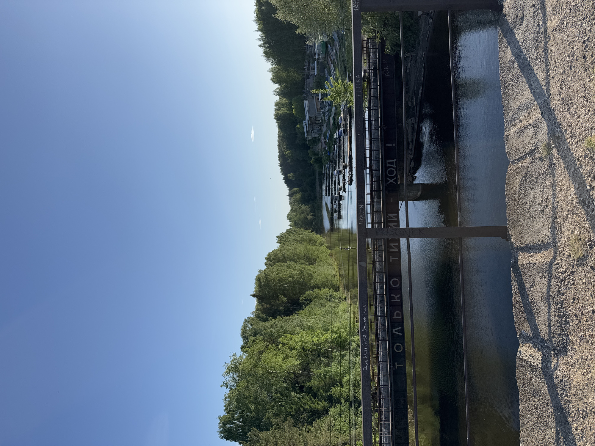 Tourist documents bridges, forests, graffiti in Chaikovsky, Russia