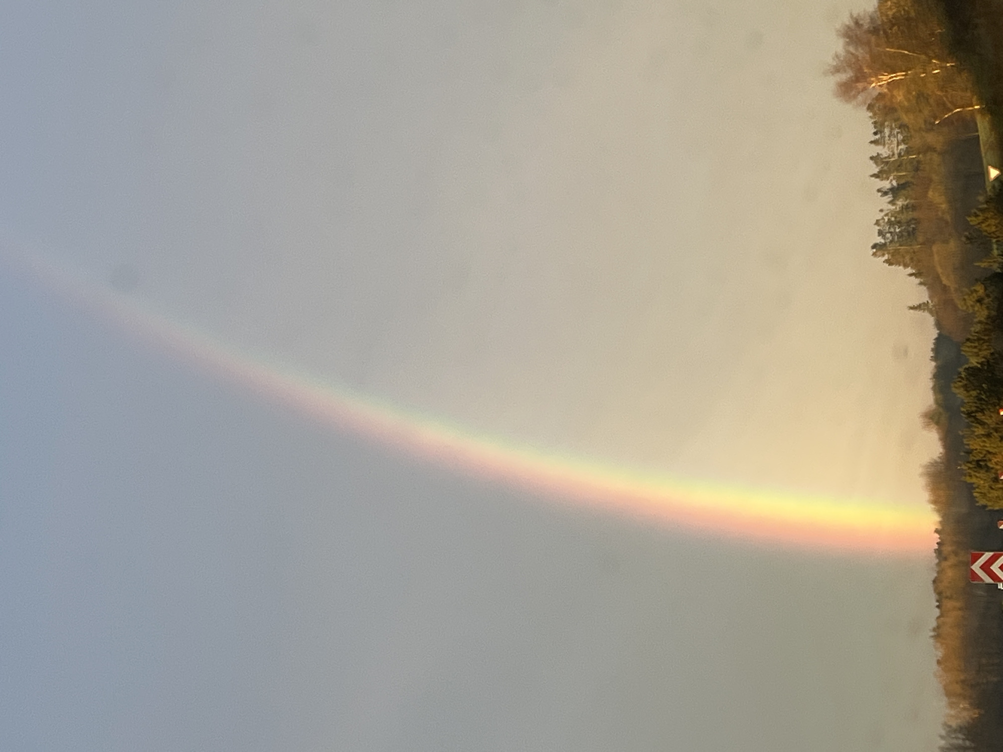 Rainbow spotted across morning sky in Aalborg, Denmark