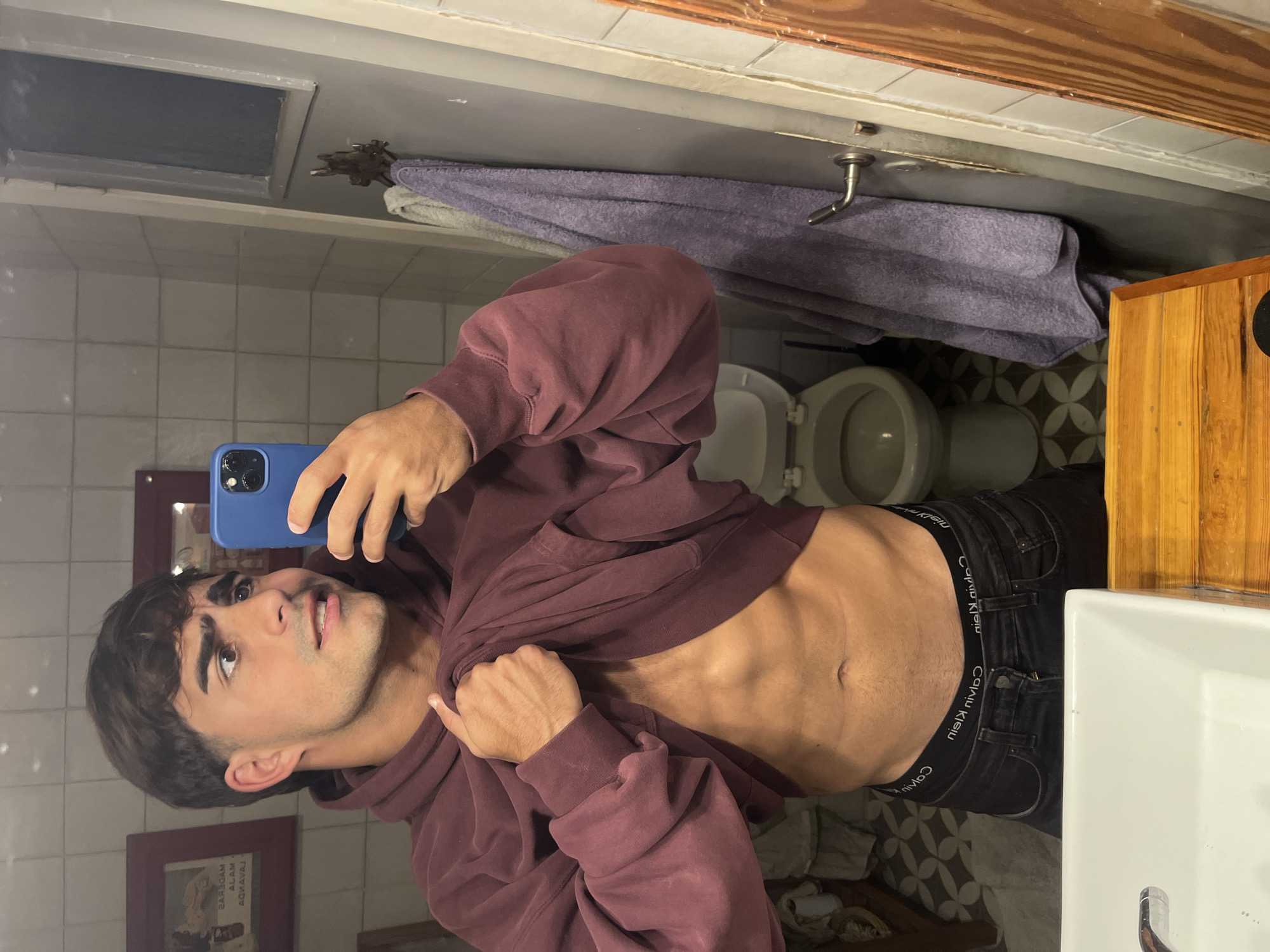 Young man takes bathroom selfies in Avellaneda, Argentina