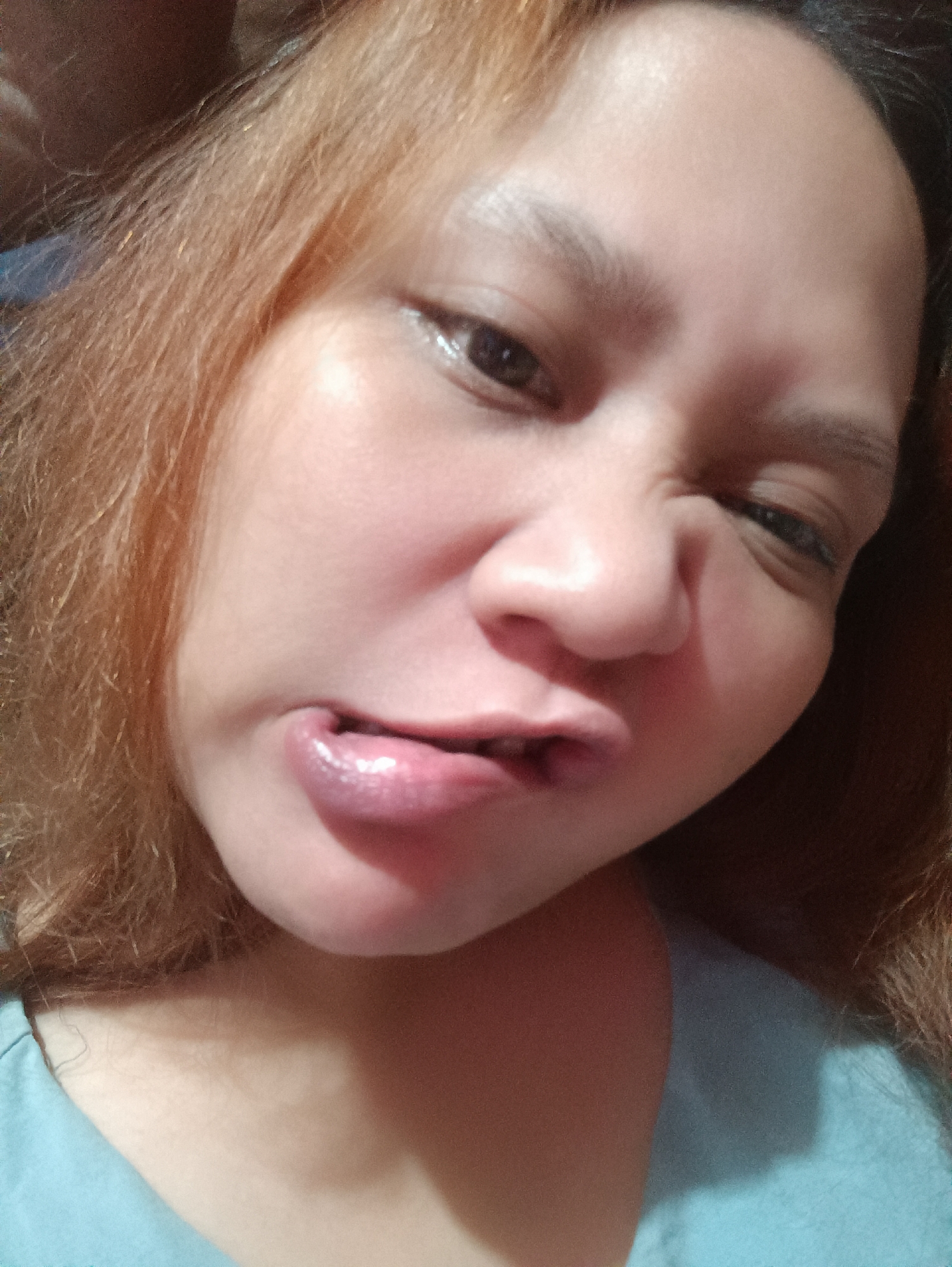 Woman documents evening routine with selfies and drinks in Depok
