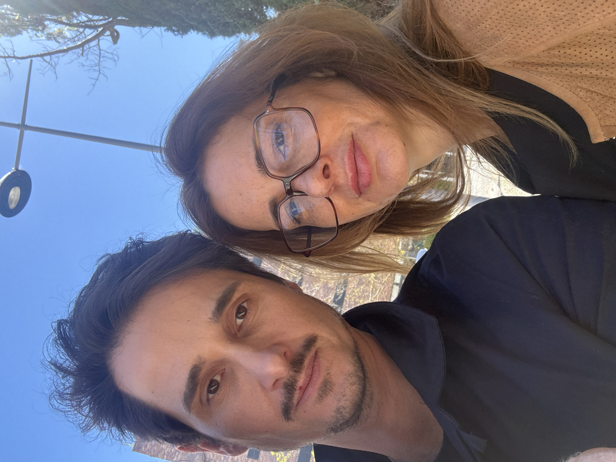 Couple takes selfies on sunny day in Lisbon