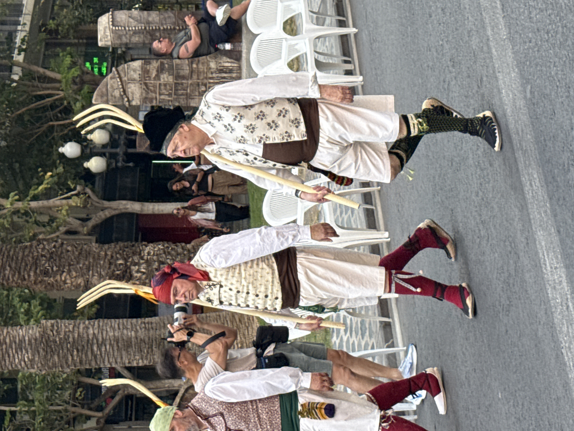 Traditional Spanish parade with Valencian costumes and marching bands