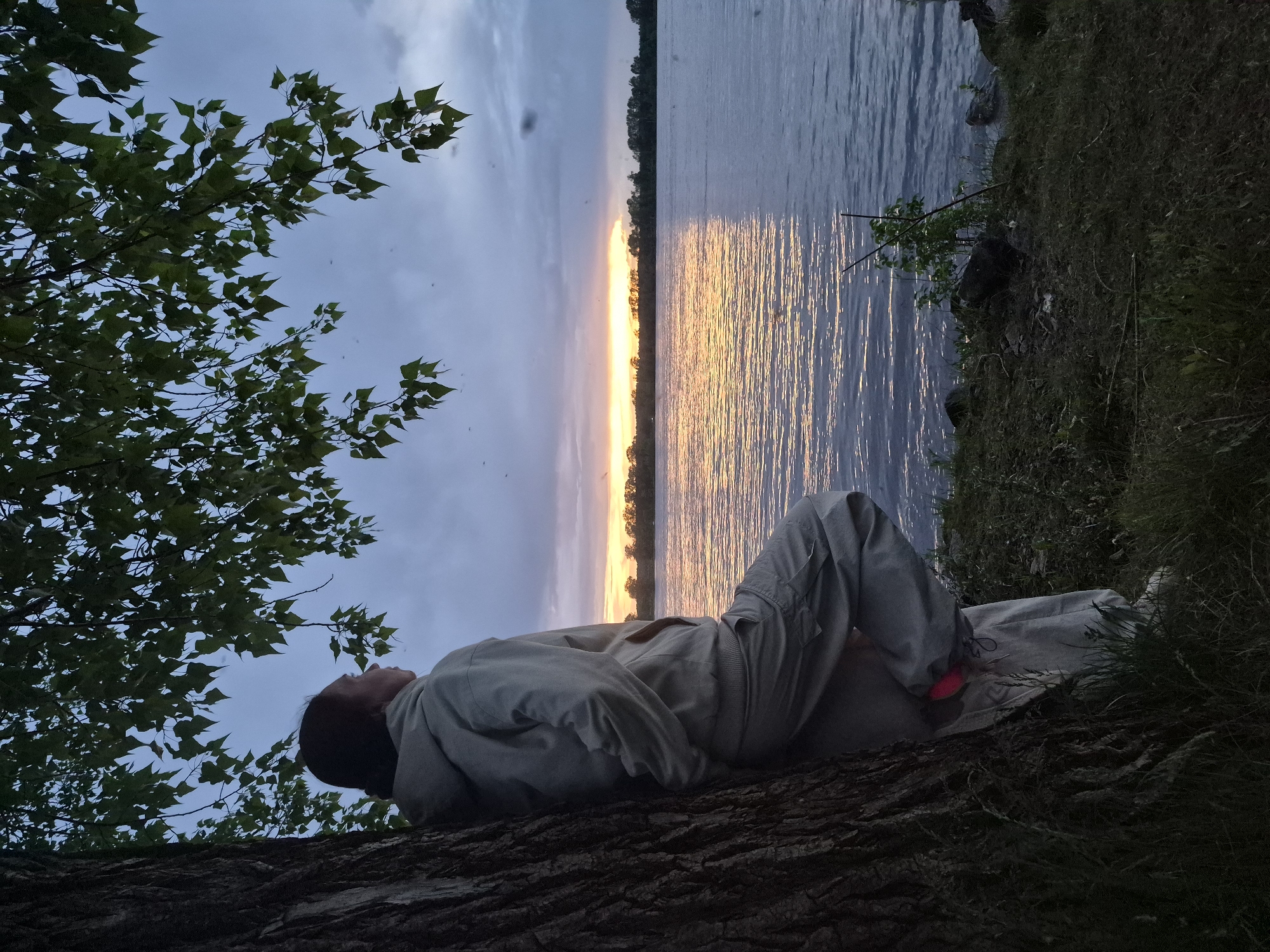Evening riverside leisure activities observed along Kama River in Chaikovsky