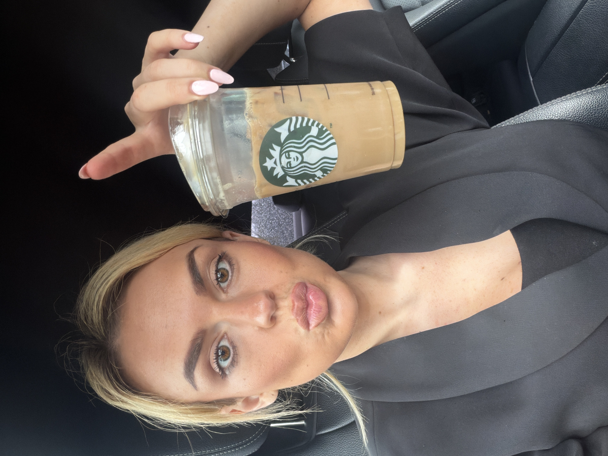 Parking lot hang, Starbucks in hand, snacks in tow