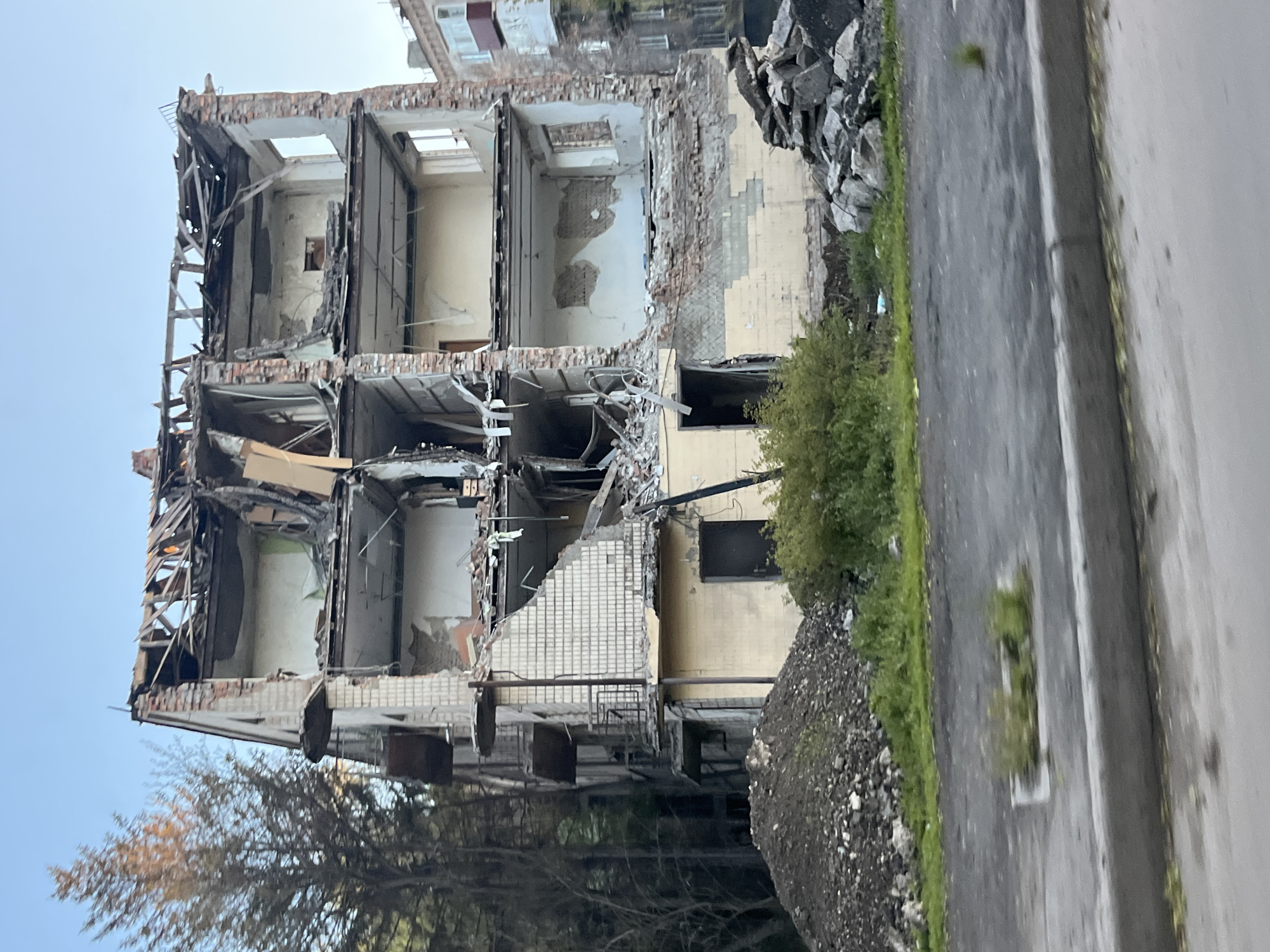 Damaged building with exposed interior documented in Kryvyi Rih