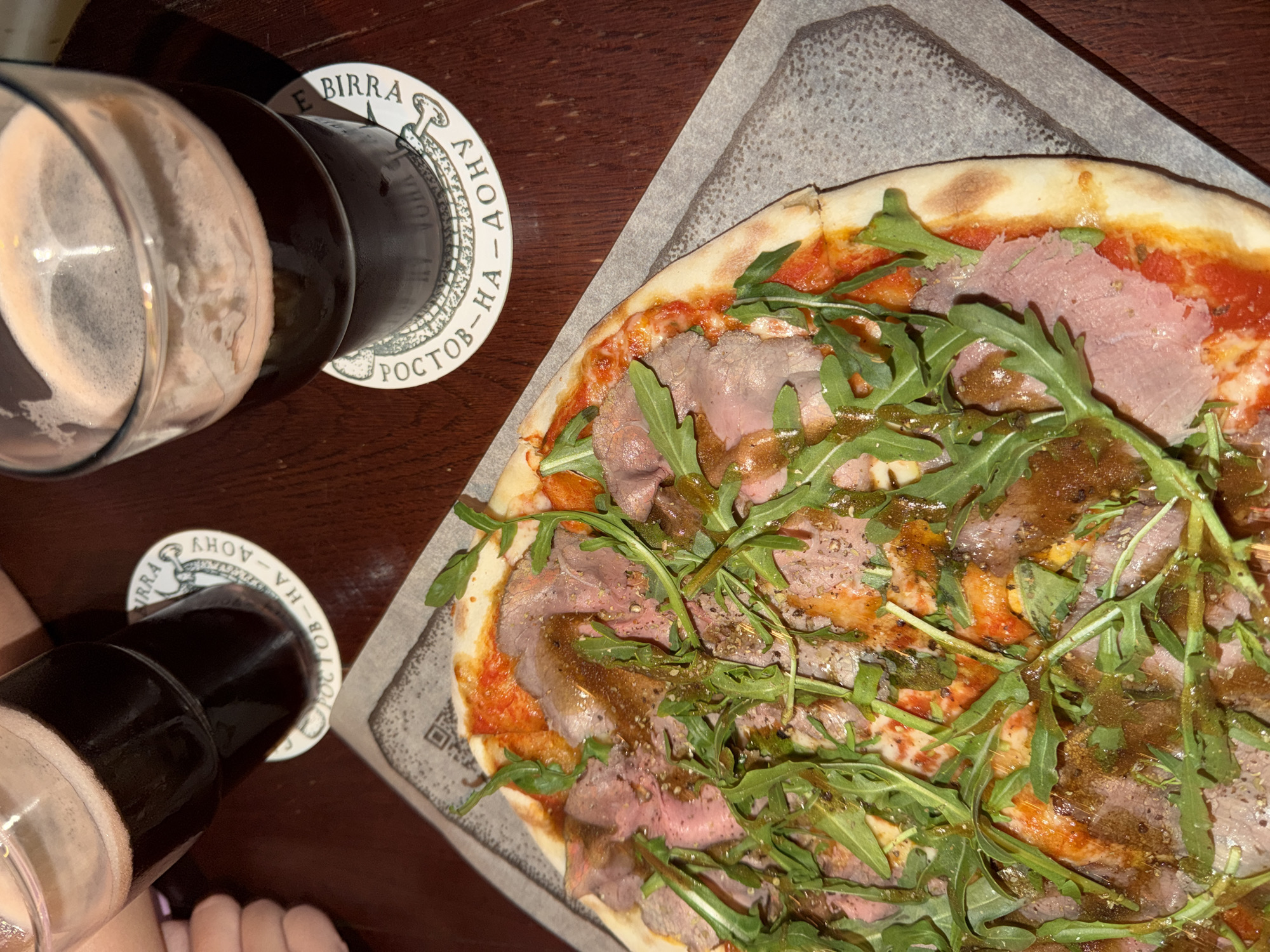 Beer and pizza documented in Rostov-on-Don dining scene