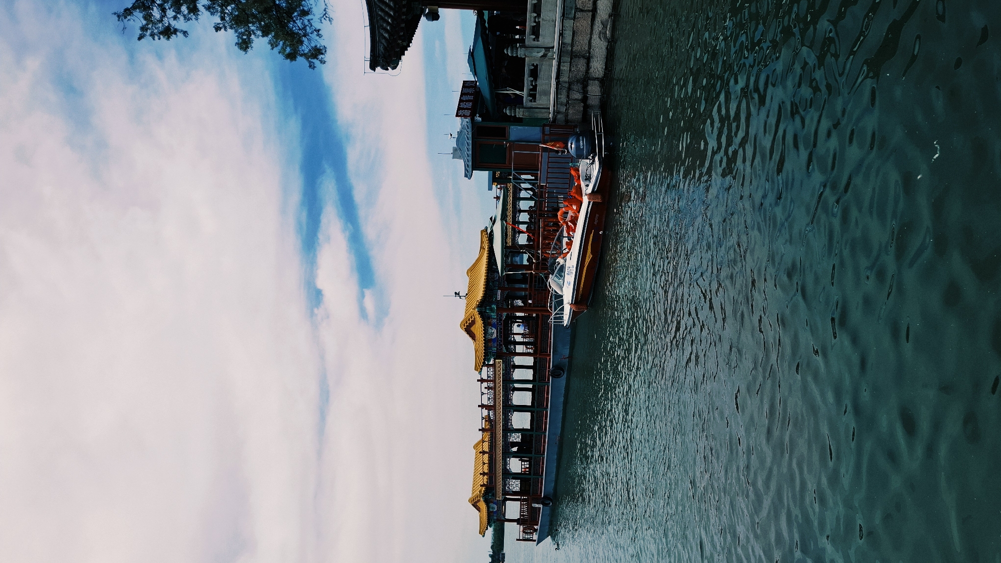 Early morning tourism documented at traditional Beijing architecture sites