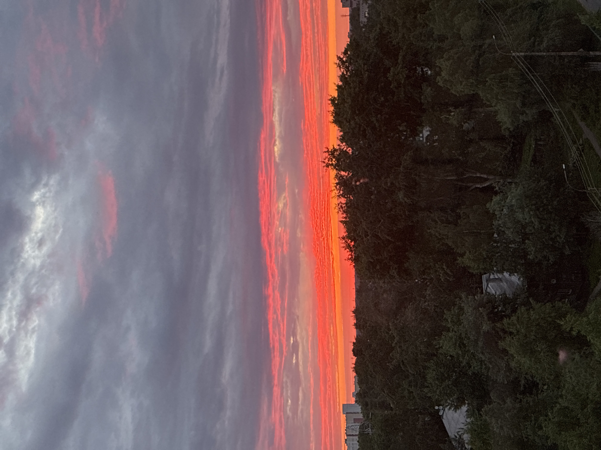Dramatic sunset documented across urban area June 10