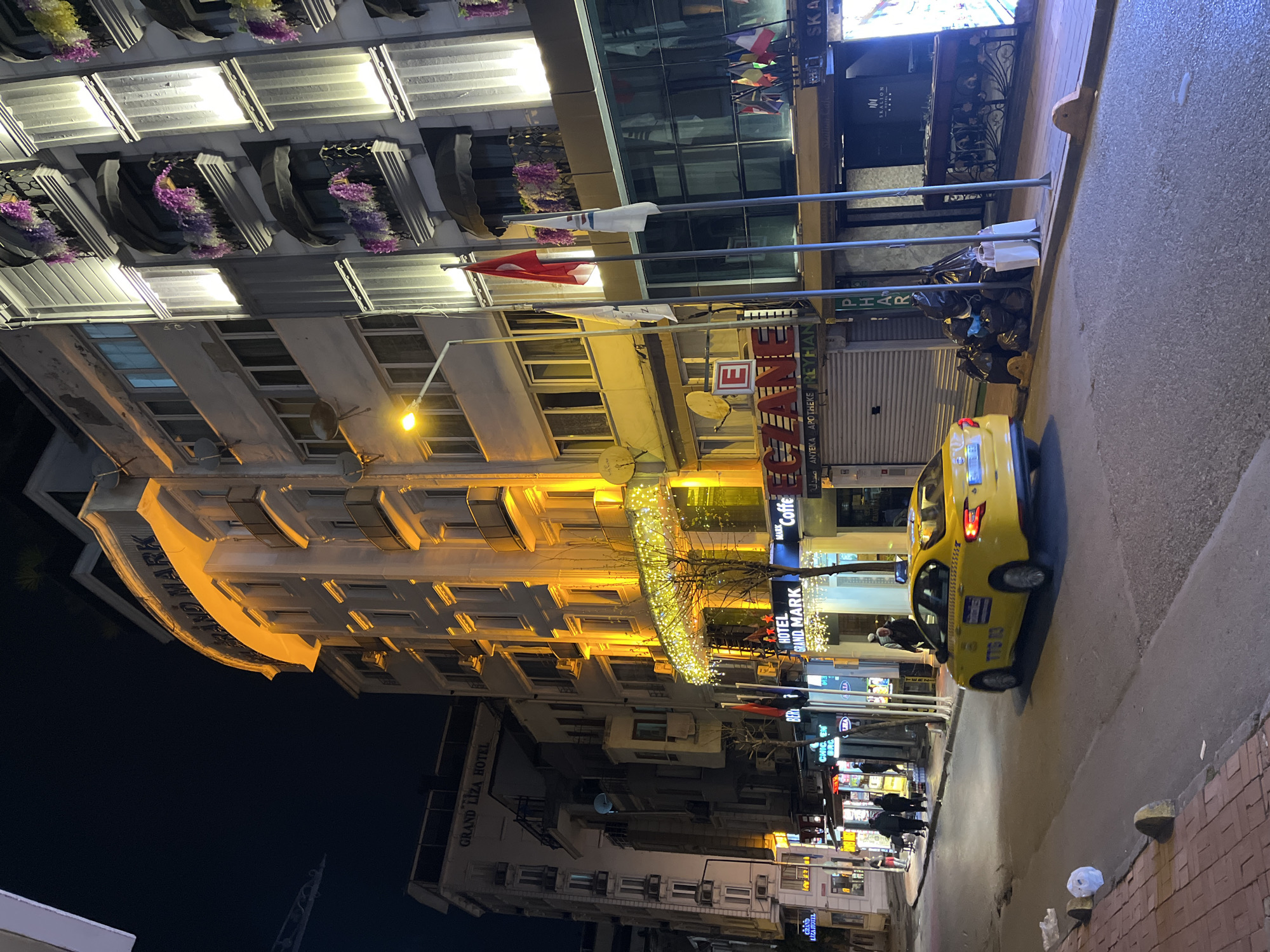 Evening street activity captured near Istanbul restaurant district