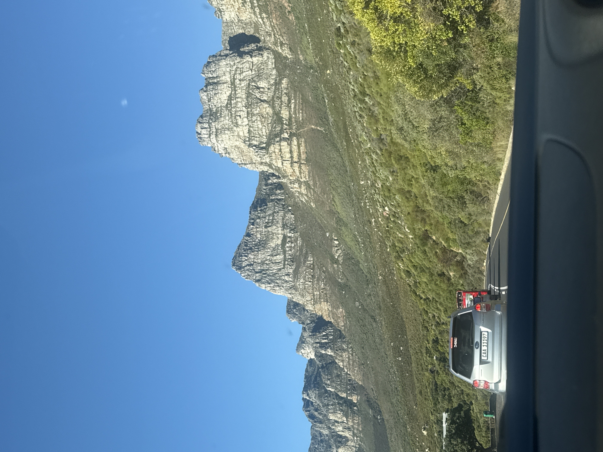 Clear day mountain views documented along Cape Town coastal road