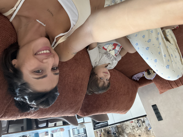 Morning routine captured: woman, child together in Khimki home