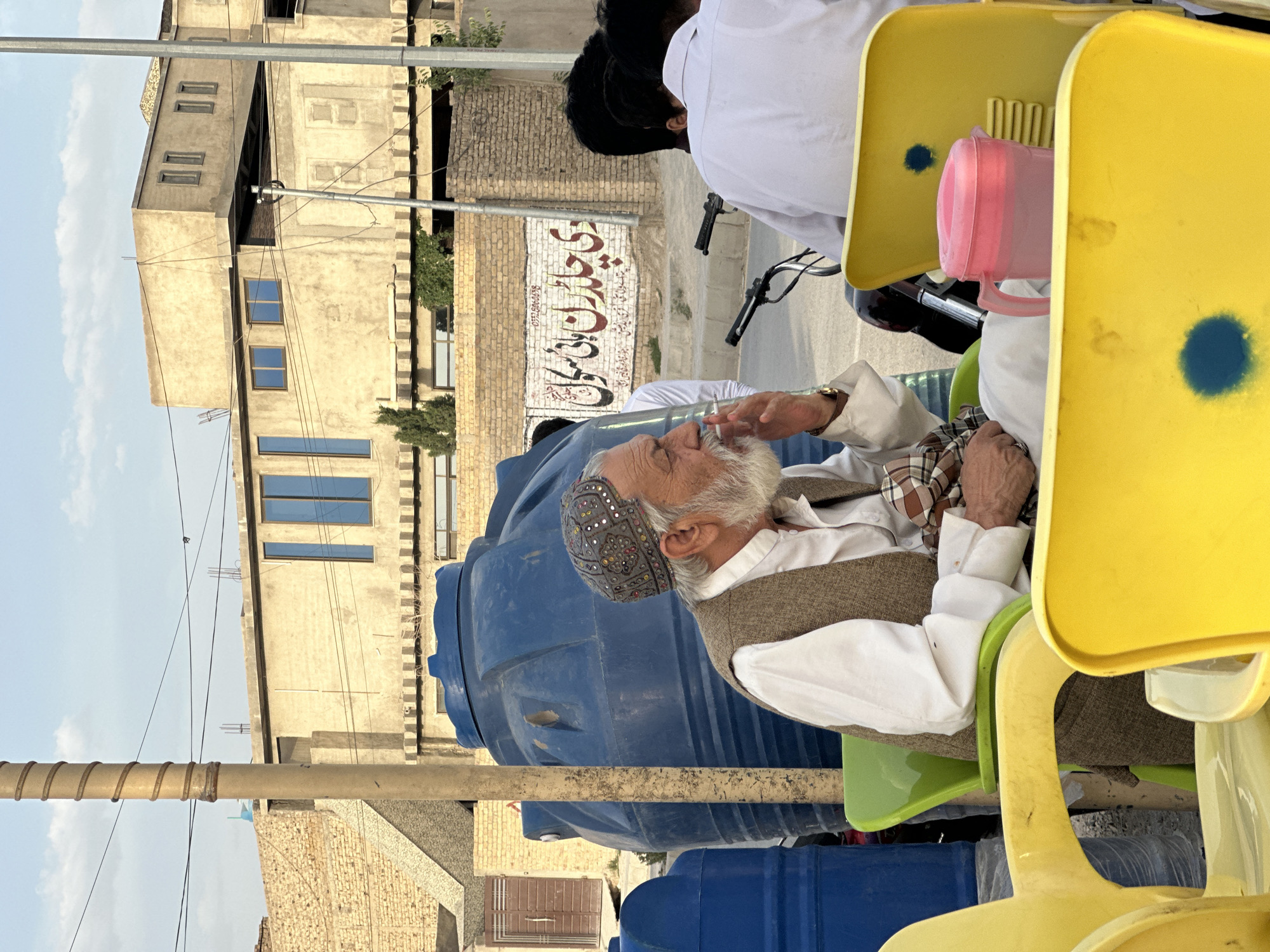 Men gather for outdoor meeting in Quetta, Pakistan