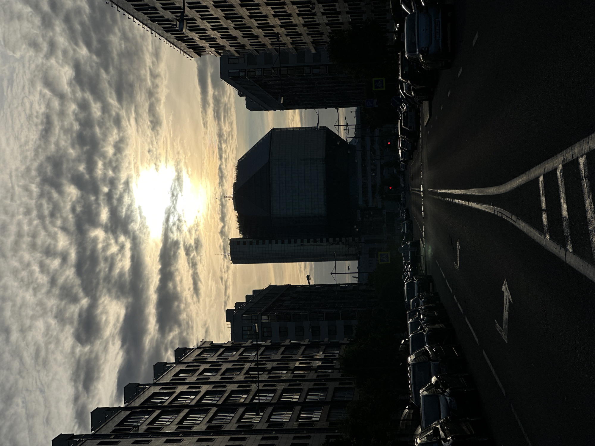 Pink branded Range Rover and urban architecture at golden hour