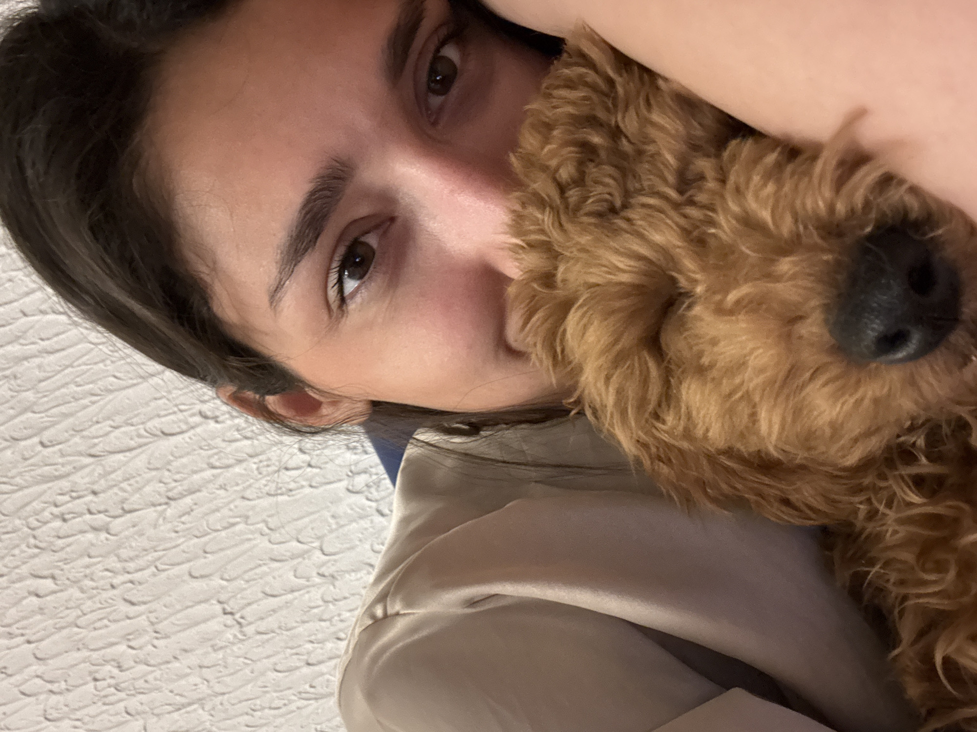 Woman takes selfie, poodle photographed in Sutomore, Montenegro