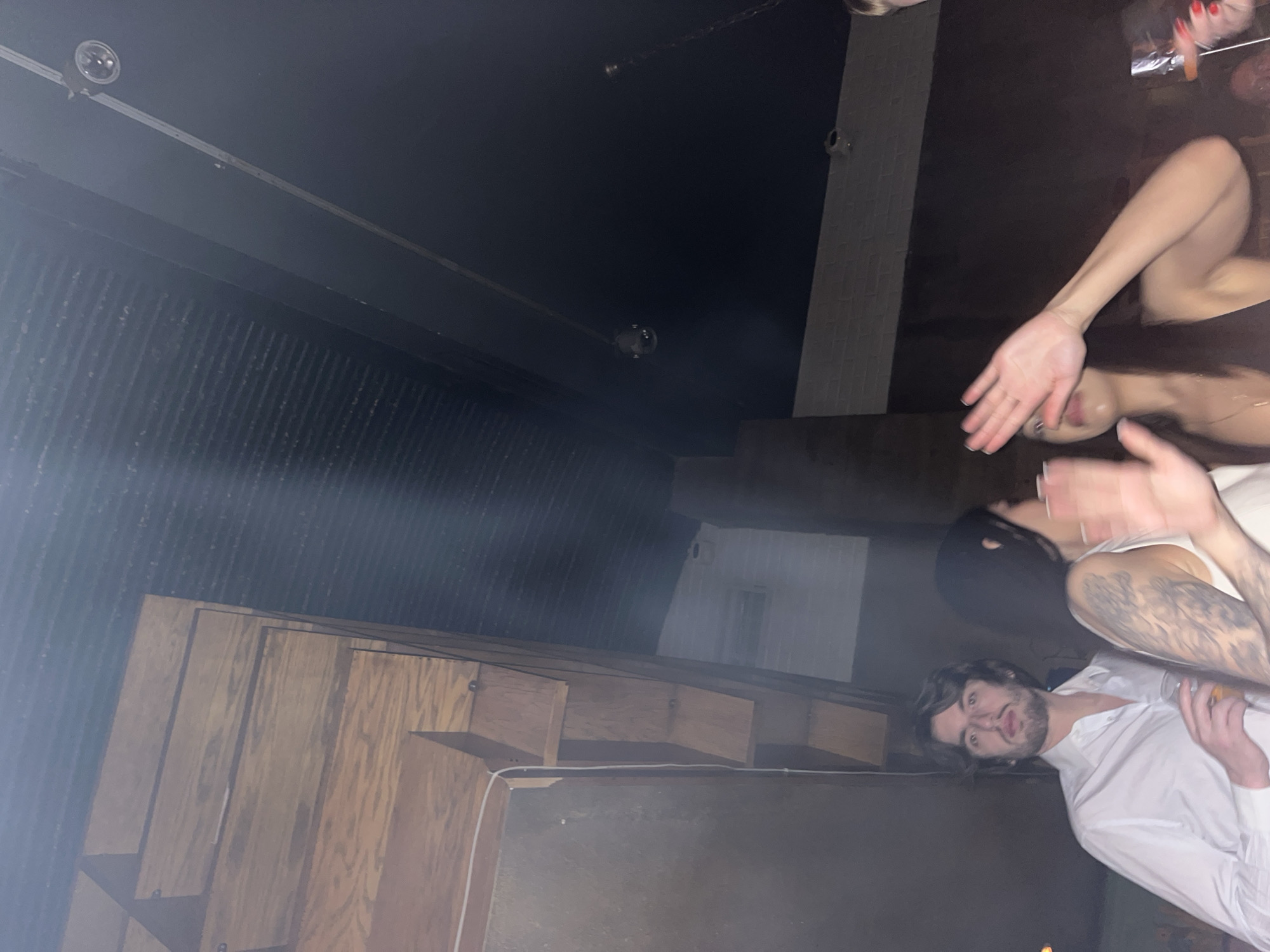 Late night social gathering observed in Moscow indoor venue